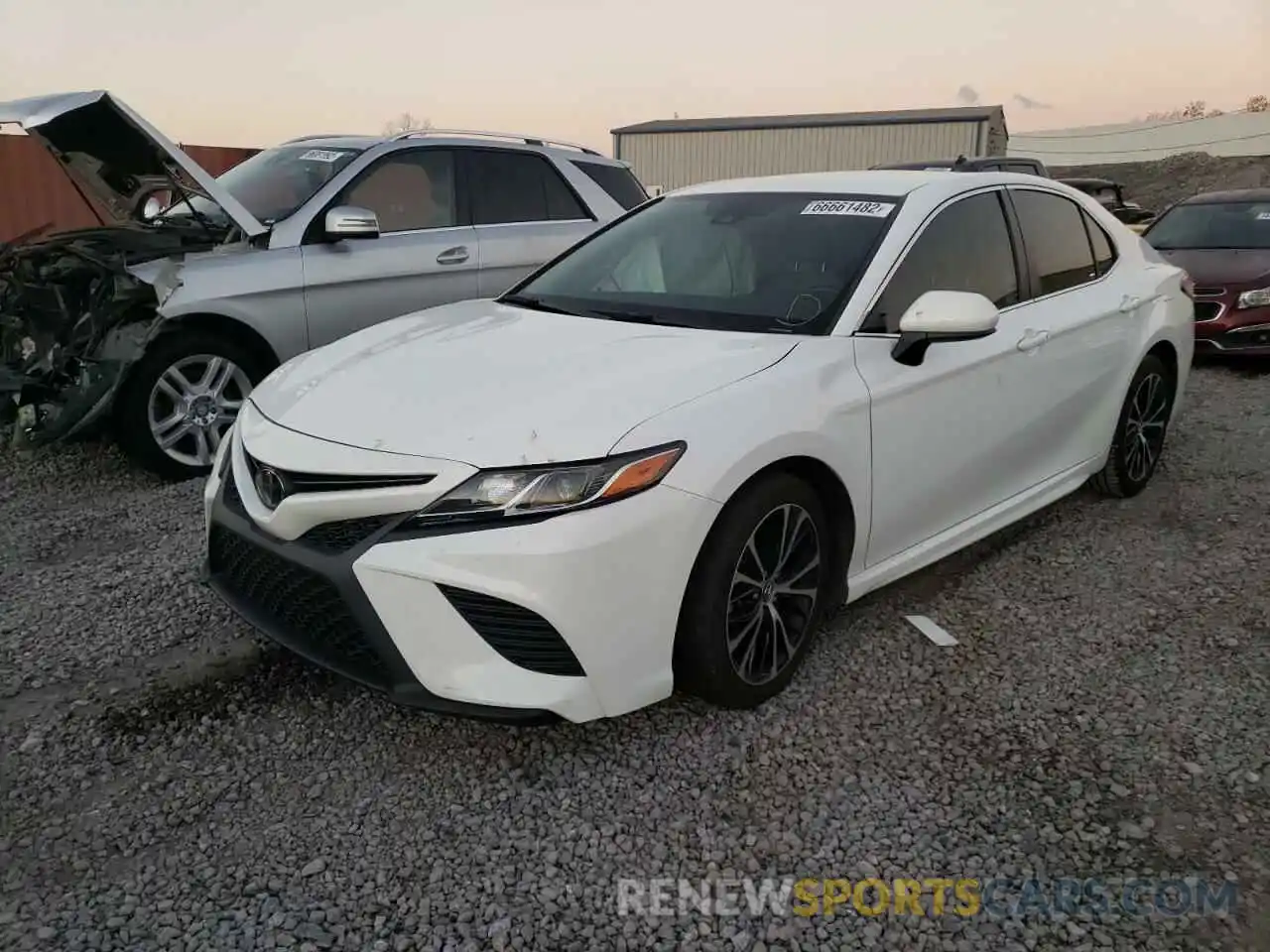 2 Photograph of a damaged car 4T1B11HK3KU801322 TOYOTA CAMRY 2019