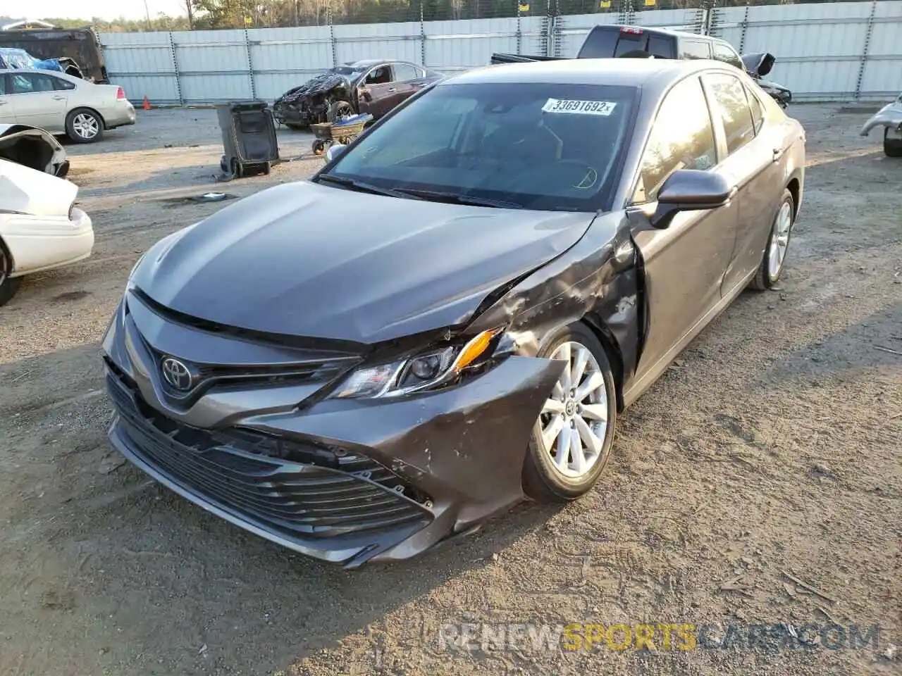 2 Photograph of a damaged car 4T1B11HK3KU812918 TOYOTA CAMRY 2019