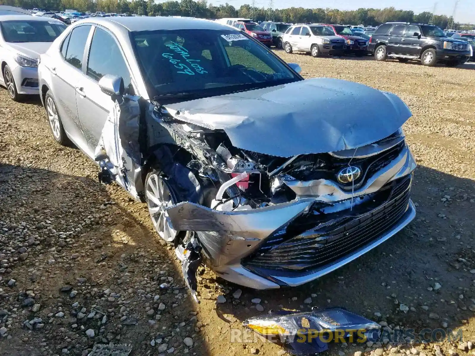 1 Photograph of a damaged car 4T1B11HK3KU814149 TOYOTA CAMRY 2019