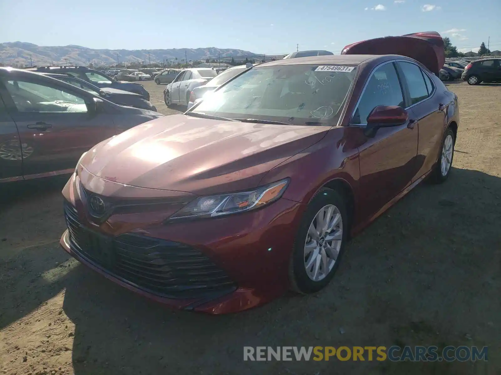 2 Photograph of a damaged car 4T1B11HK3KU817407 TOYOTA CAMRY 2019