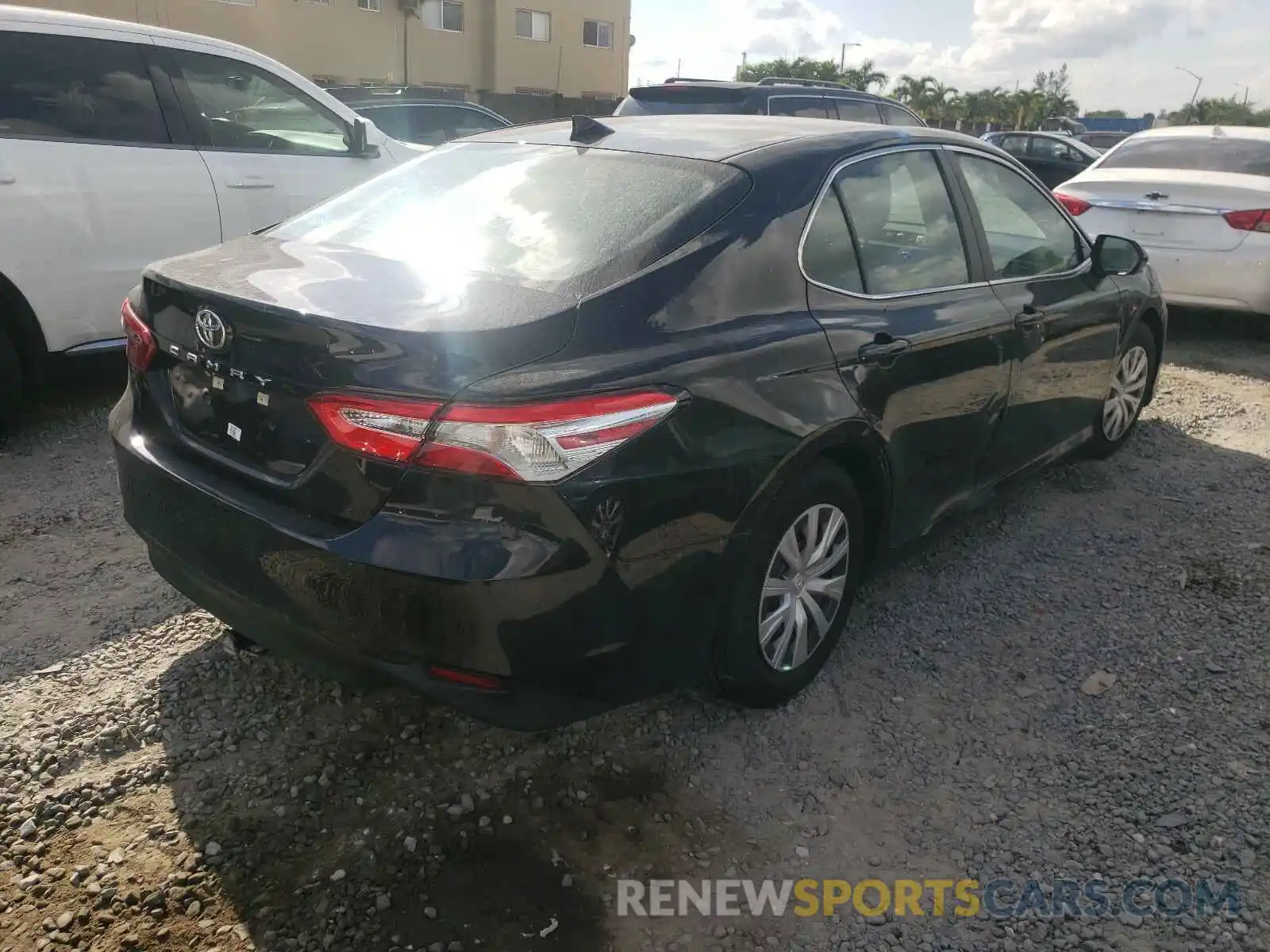 4 Photograph of a damaged car 4T1B11HK3KU821523 TOYOTA CAMRY 2019