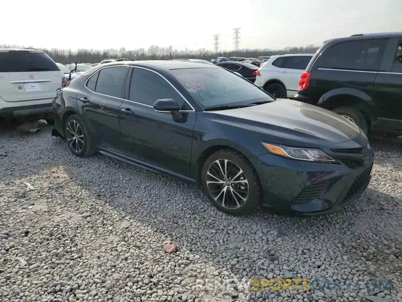 4 Photograph of a damaged car 4T1B11HK3KU822509 TOYOTA CAMRY 2019