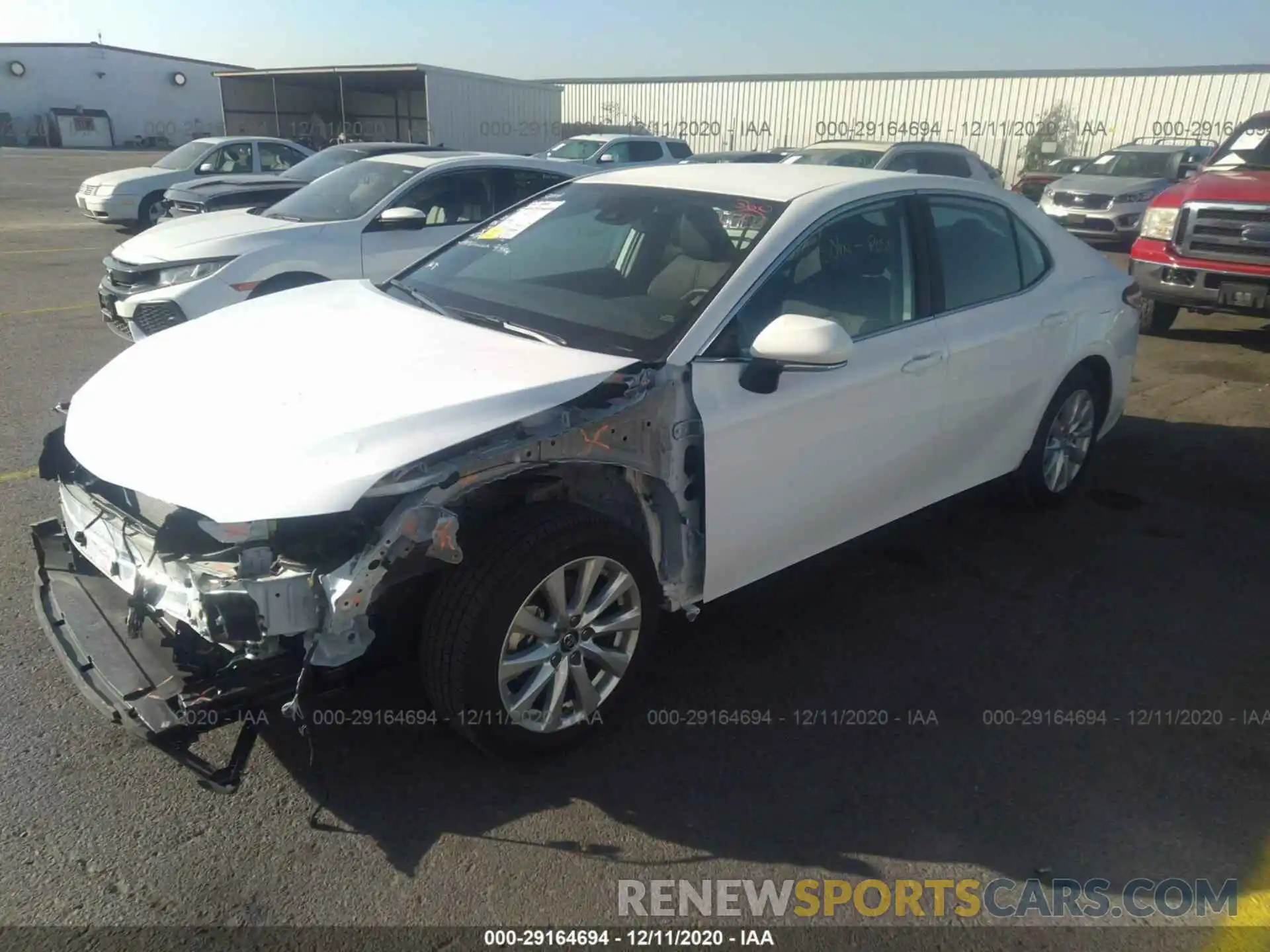 2 Photograph of a damaged car 4T1B11HK3KU824504 TOYOTA CAMRY 2019