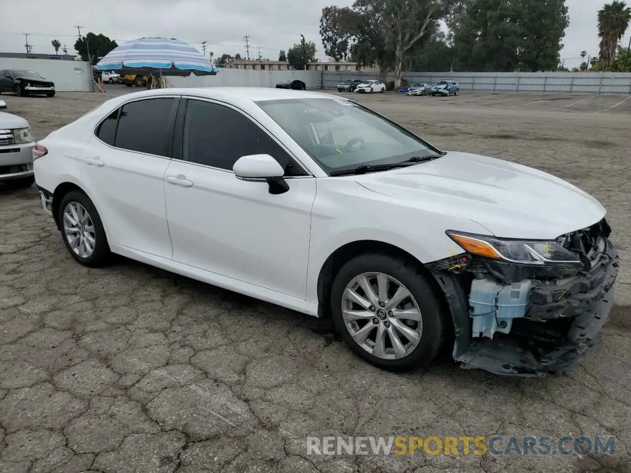 4 Photograph of a damaged car 4T1B11HK3KU835390 TOYOTA CAMRY 2019