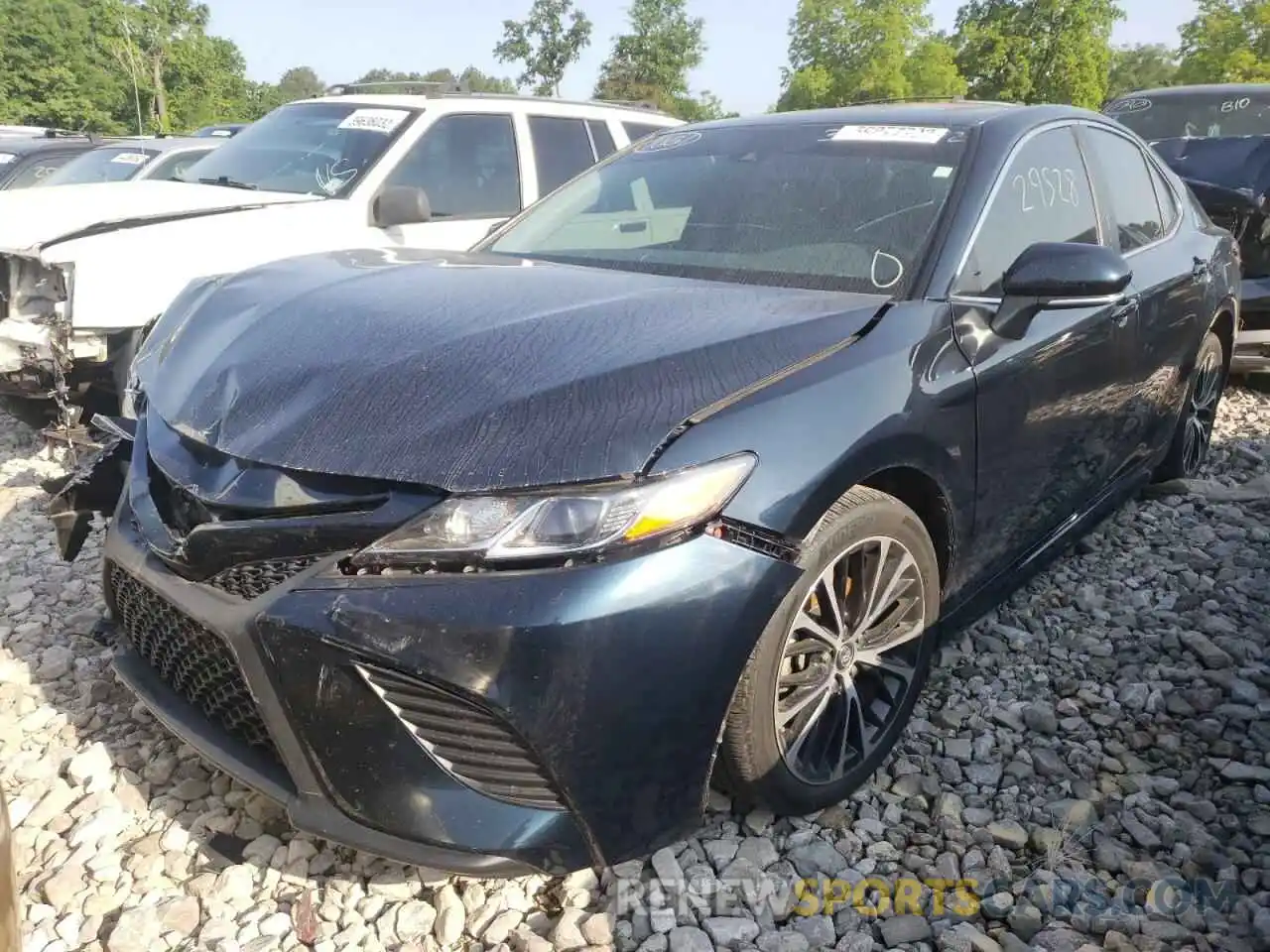 2 Photograph of a damaged car 4T1B11HK3KU836474 TOYOTA CAMRY 2019