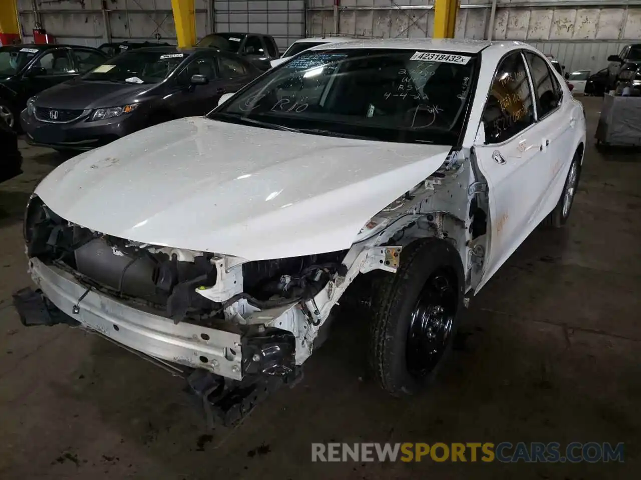 2 Photograph of a damaged car 4T1B11HK3KU837589 TOYOTA CAMRY 2019