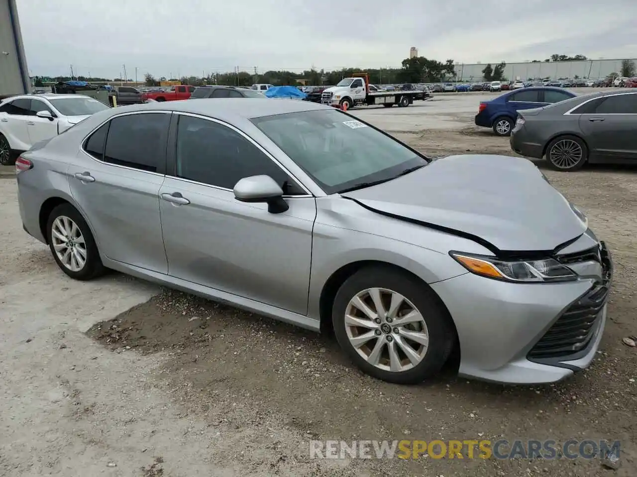 4 Photograph of a damaged car 4T1B11HK3KU844705 TOYOTA CAMRY 2019