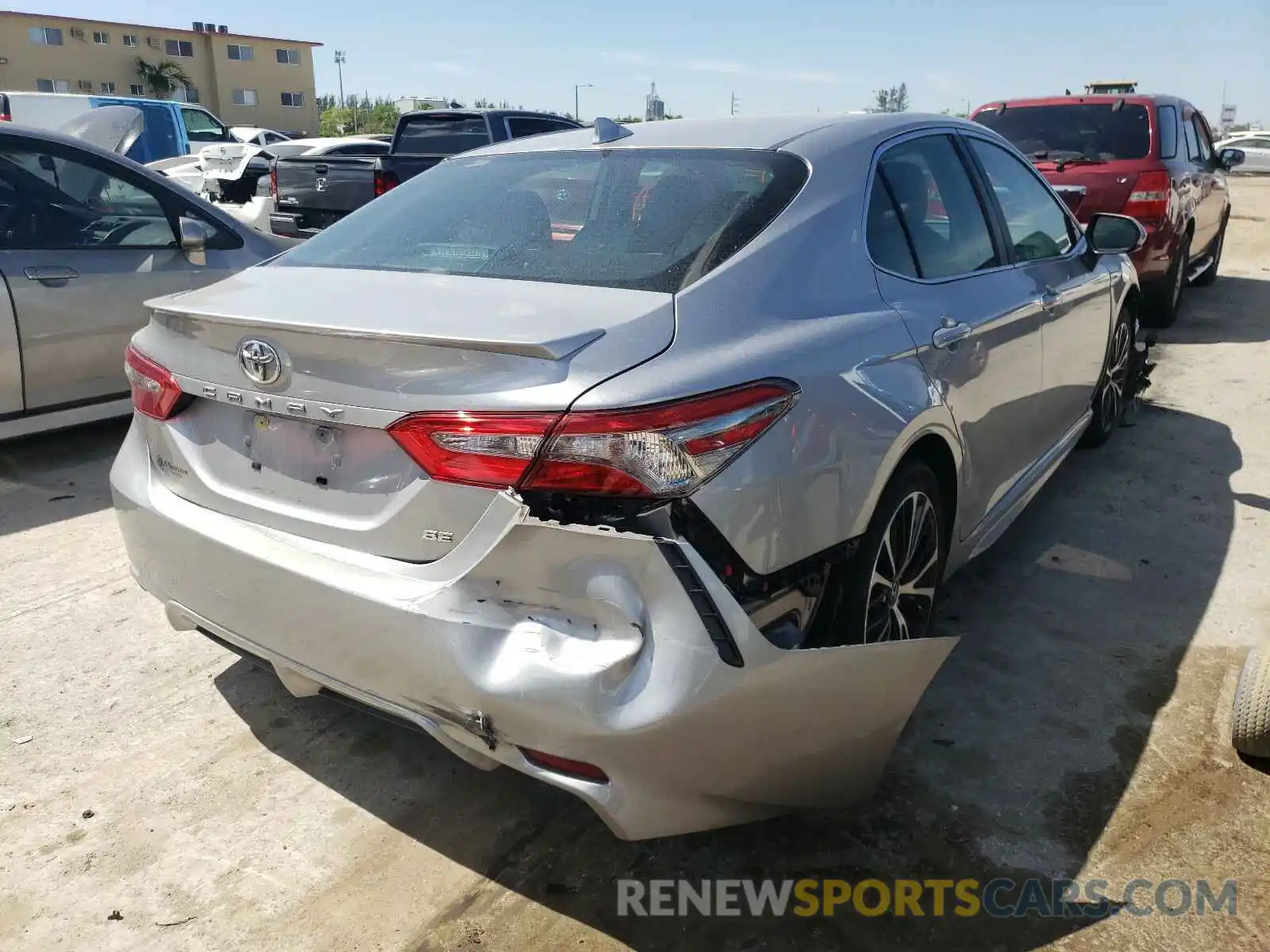 4 Photograph of a damaged car 4T1B11HK4KU164778 TOYOTA CAMRY 2019