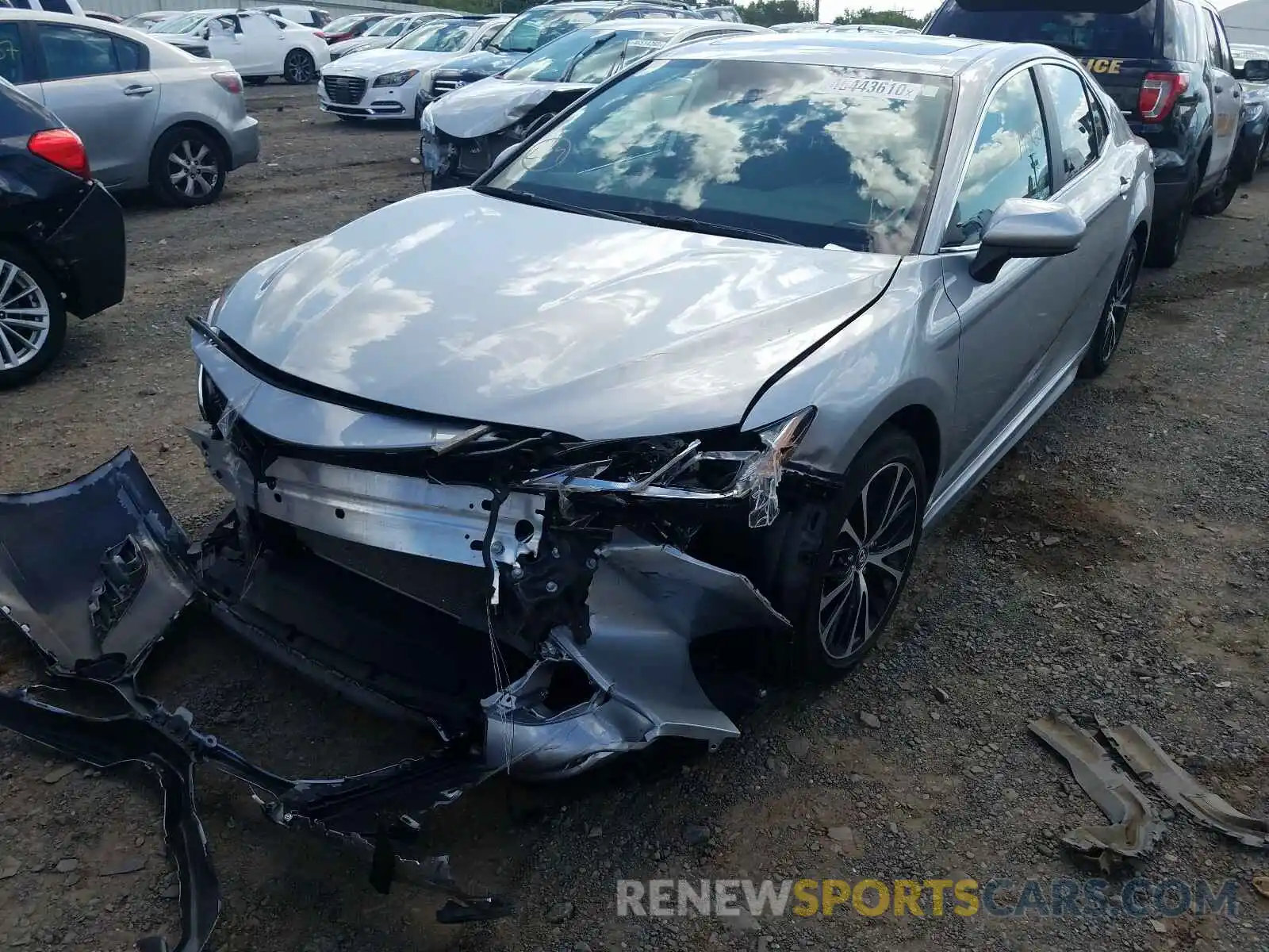 2 Photograph of a damaged car 4T1B11HK4KU168121 TOYOTA CAMRY 2019