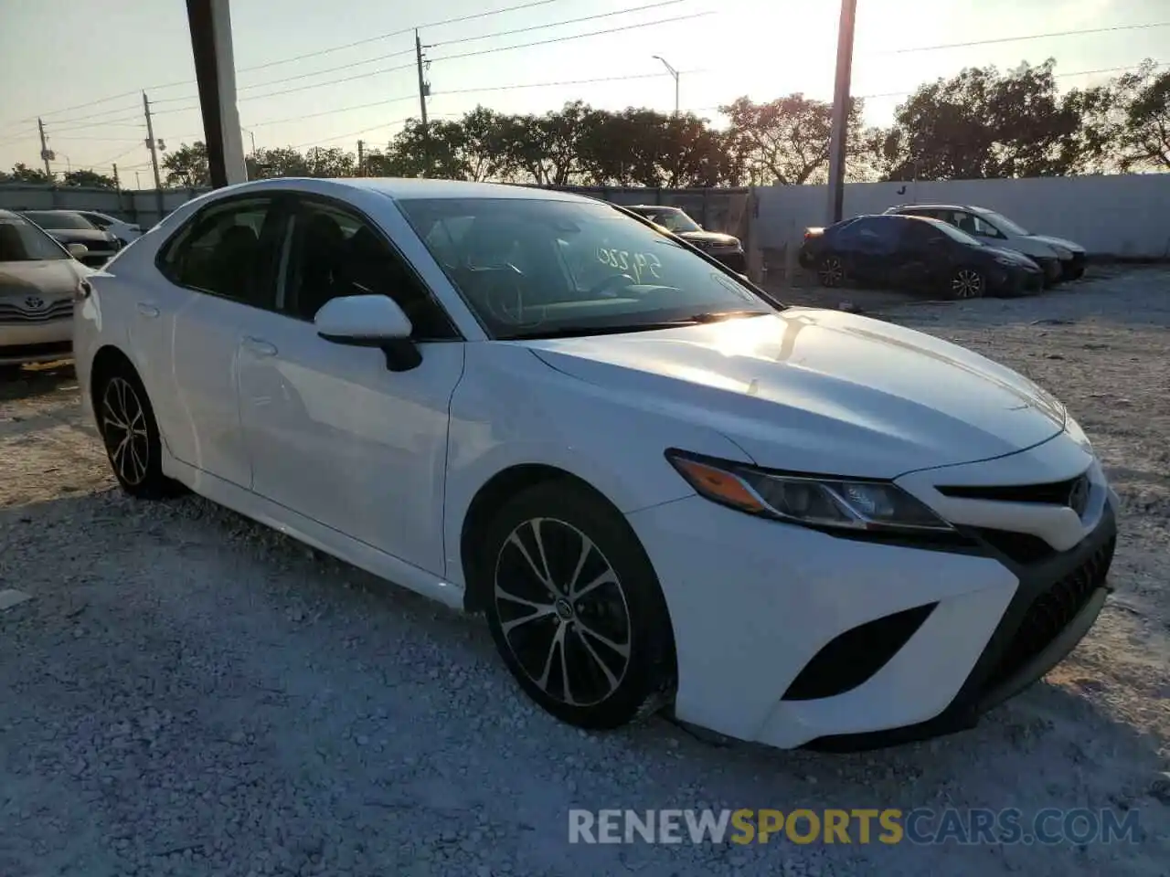 4 Photograph of a damaged car 4T1B11HK4KU168474 TOYOTA CAMRY 2019