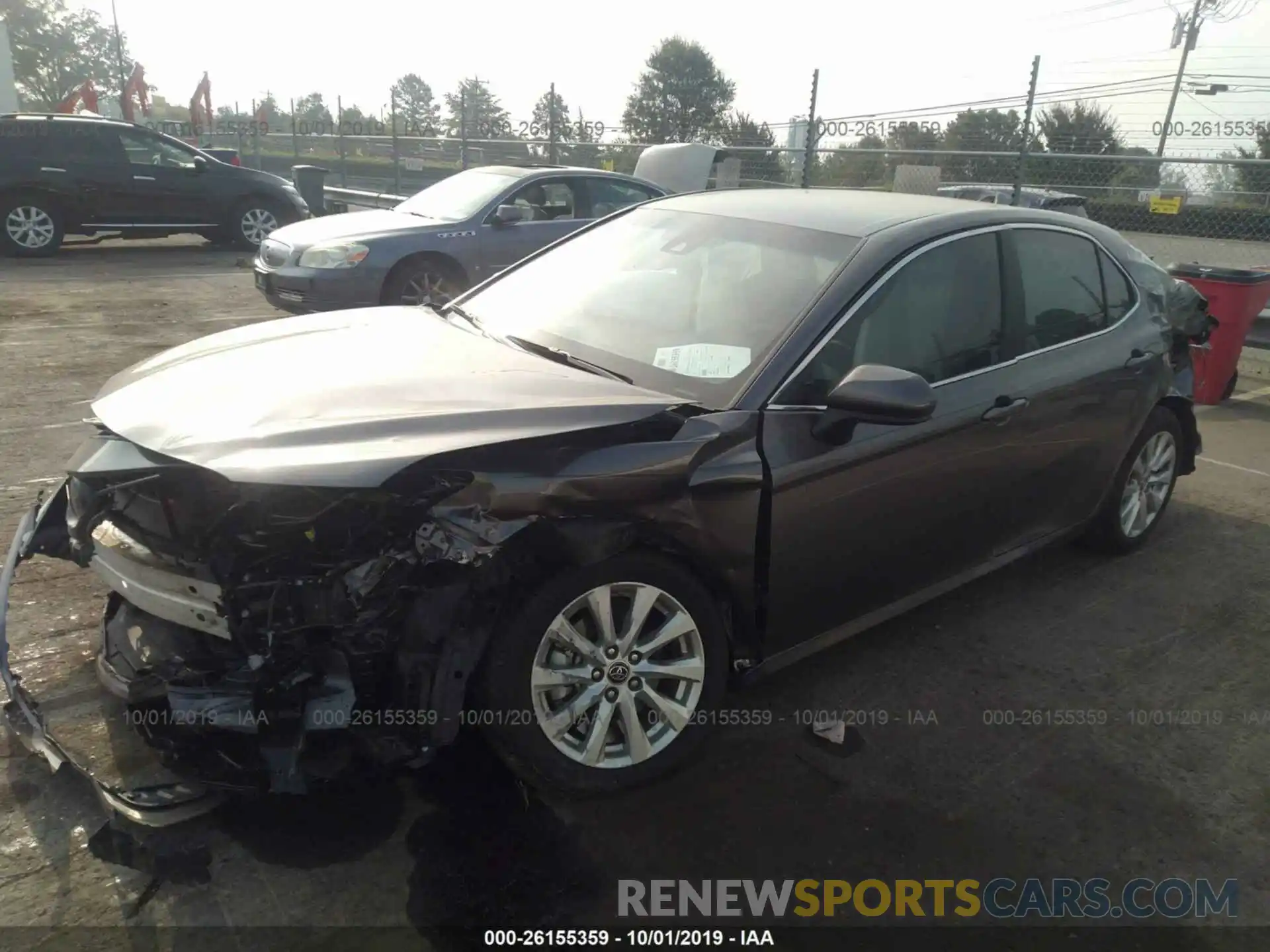 2 Photograph of a damaged car 4T1B11HK4KU171987 TOYOTA CAMRY 2019