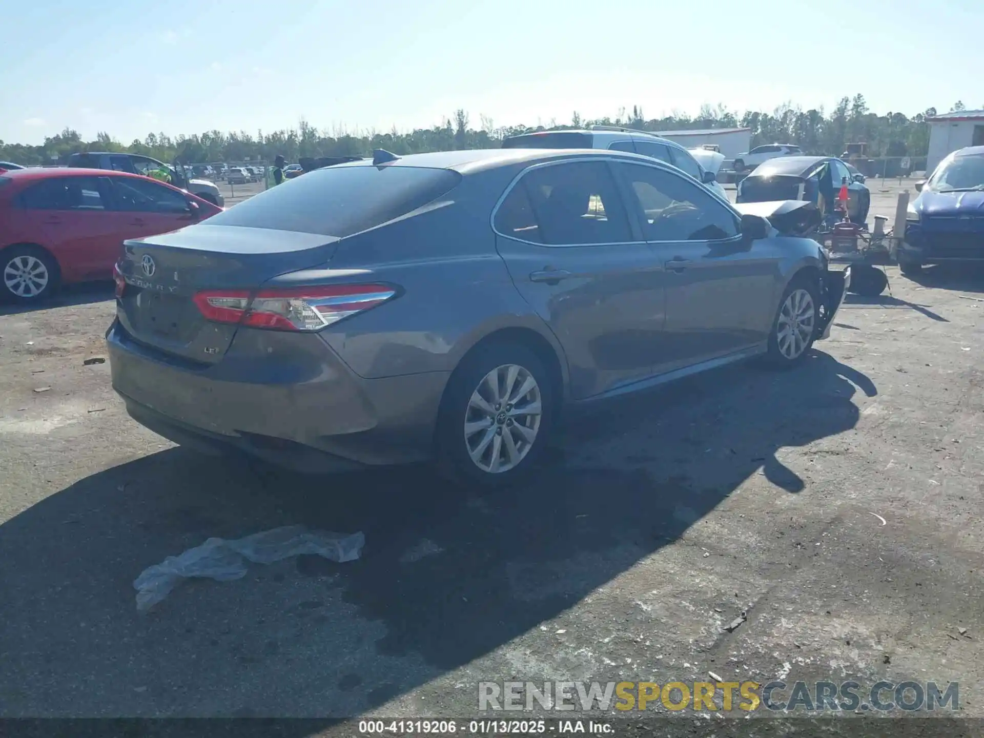 4 Photograph of a damaged car 4T1B11HK4KU184304 TOYOTA CAMRY 2019