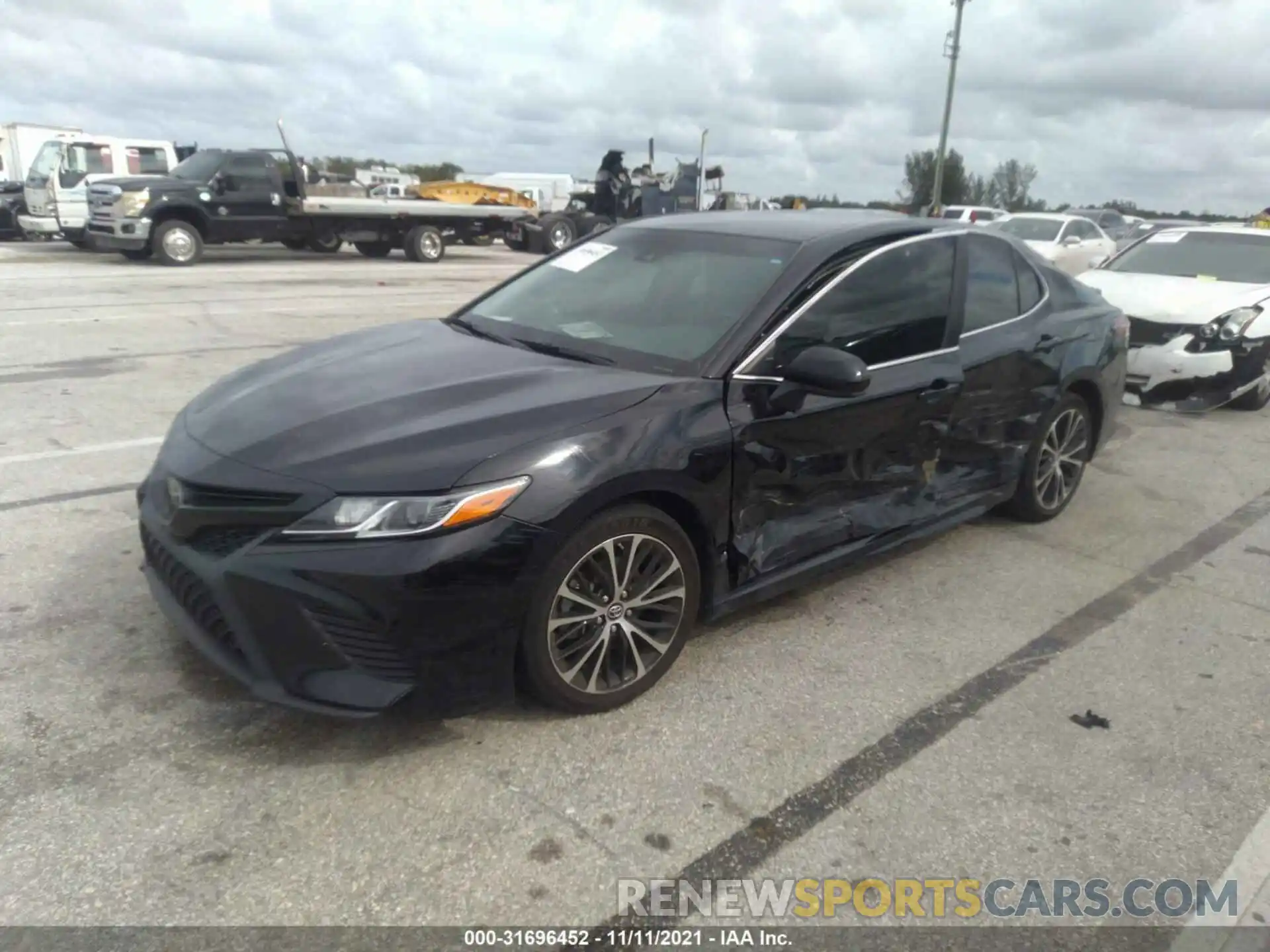 2 Photograph of a damaged car 4T1B11HK4KU185503 TOYOTA CAMRY 2019