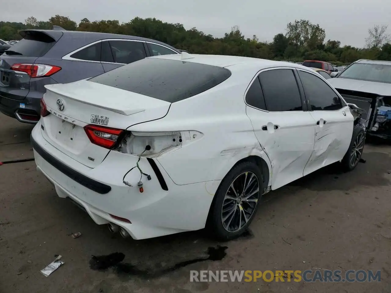 3 Photograph of a damaged car 4T1B11HK4KU193987 TOYOTA CAMRY 2019