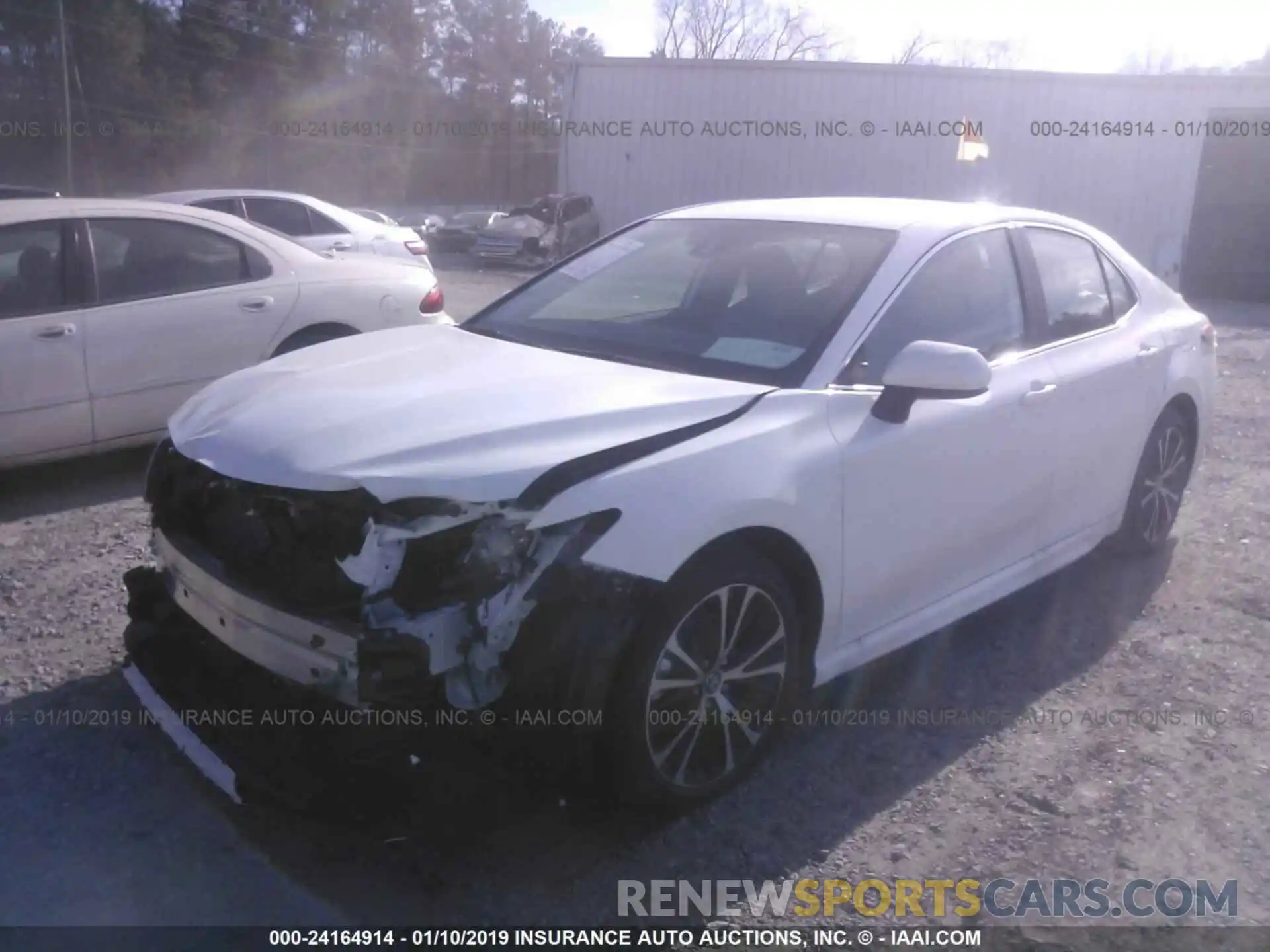 2 Photograph of a damaged car 4T1B11HK4KU197747 TOYOTA CAMRY 2019