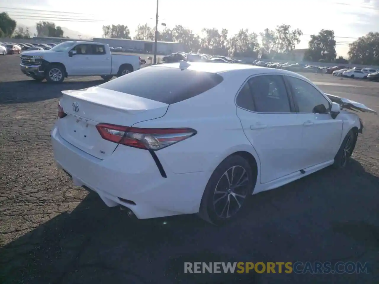 4 Photograph of a damaged car 4T1B11HK4KU197943 TOYOTA CAMRY 2019