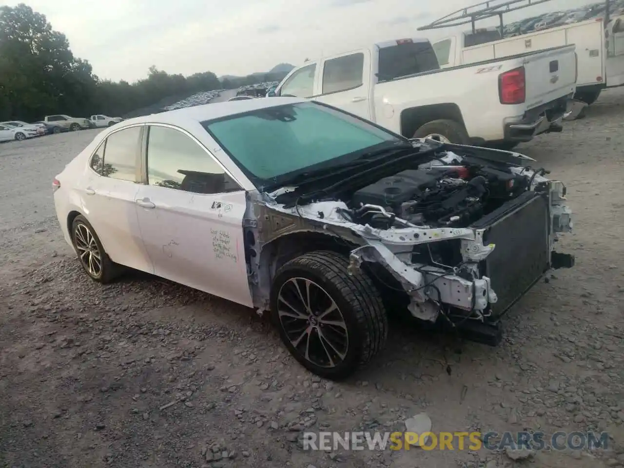 4 Photograph of a damaged car 4T1B11HK4KU203403 TOYOTA CAMRY 2019