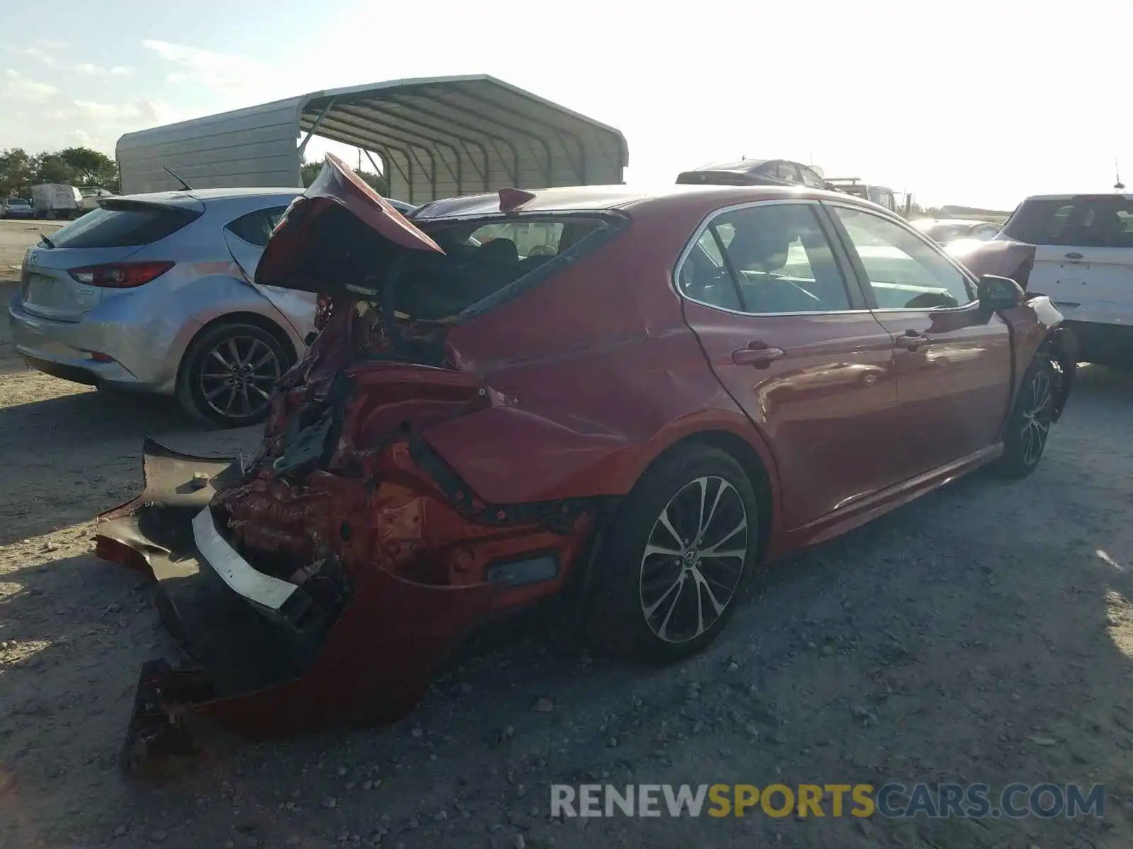 4 Photograph of a damaged car 4T1B11HK4KU206429 TOYOTA CAMRY 2019