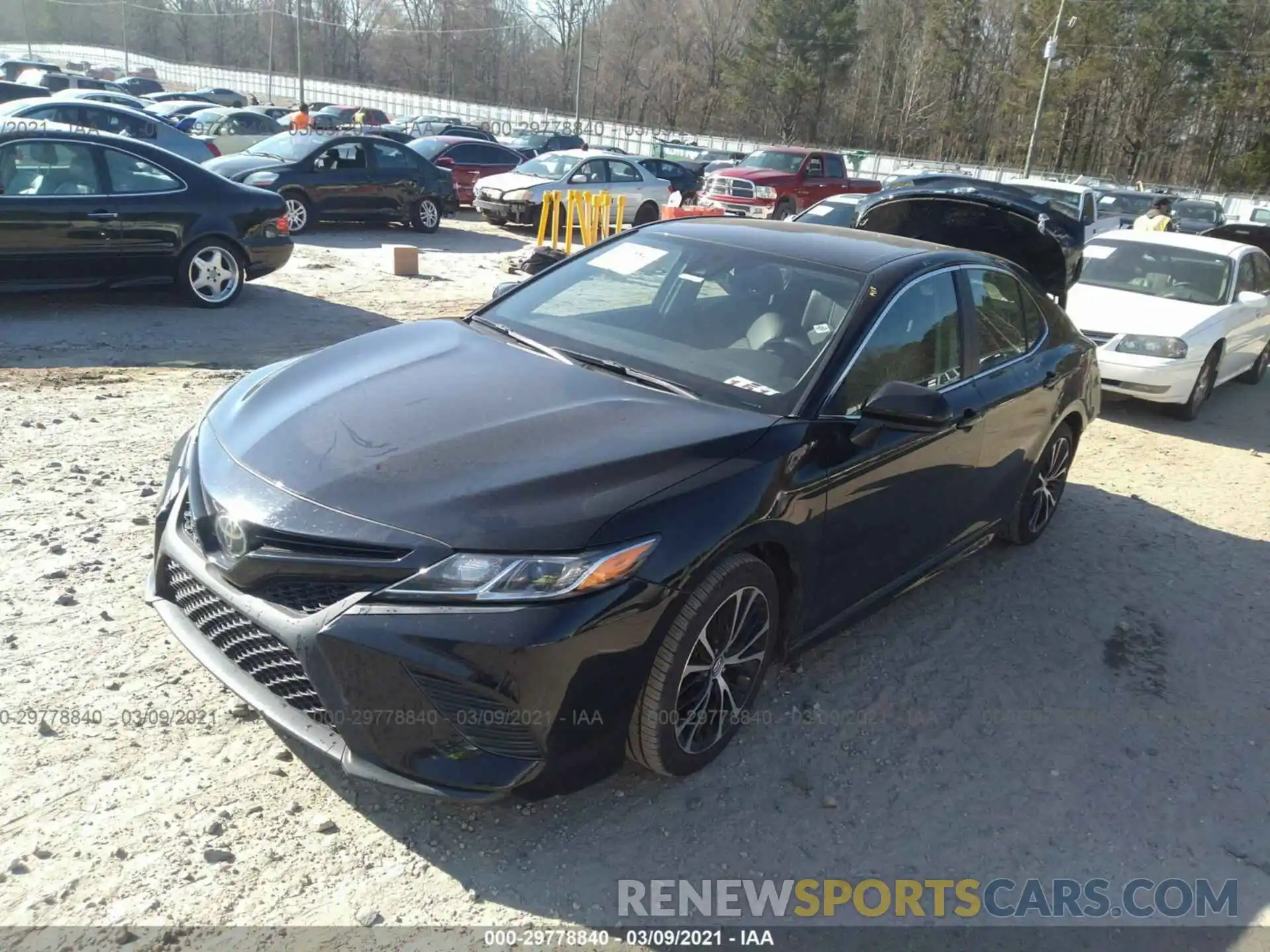 2 Photograph of a damaged car 4T1B11HK4KU209475 TOYOTA CAMRY 2019