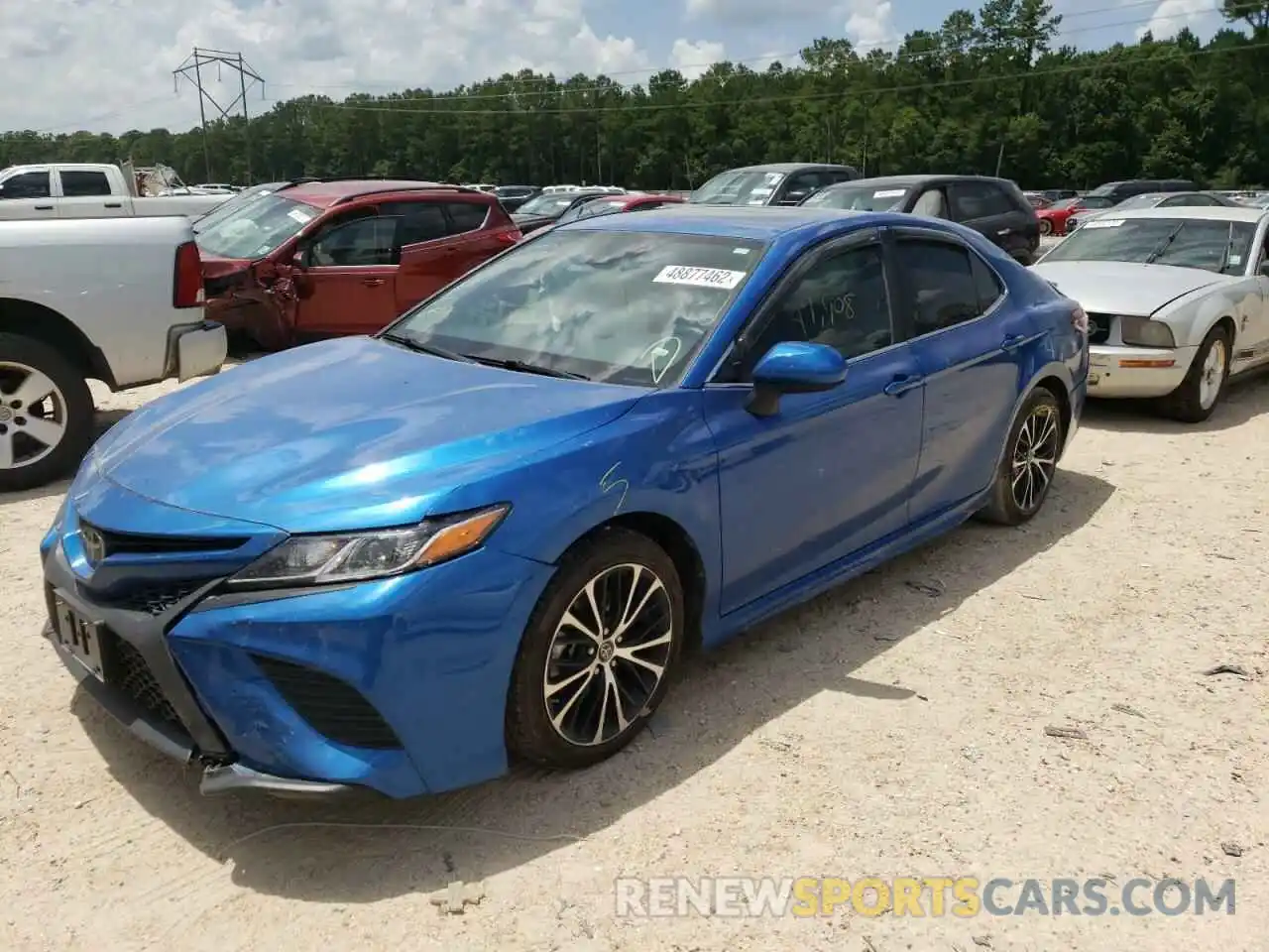 2 Photograph of a damaged car 4T1B11HK4KU211663 TOYOTA CAMRY 2019