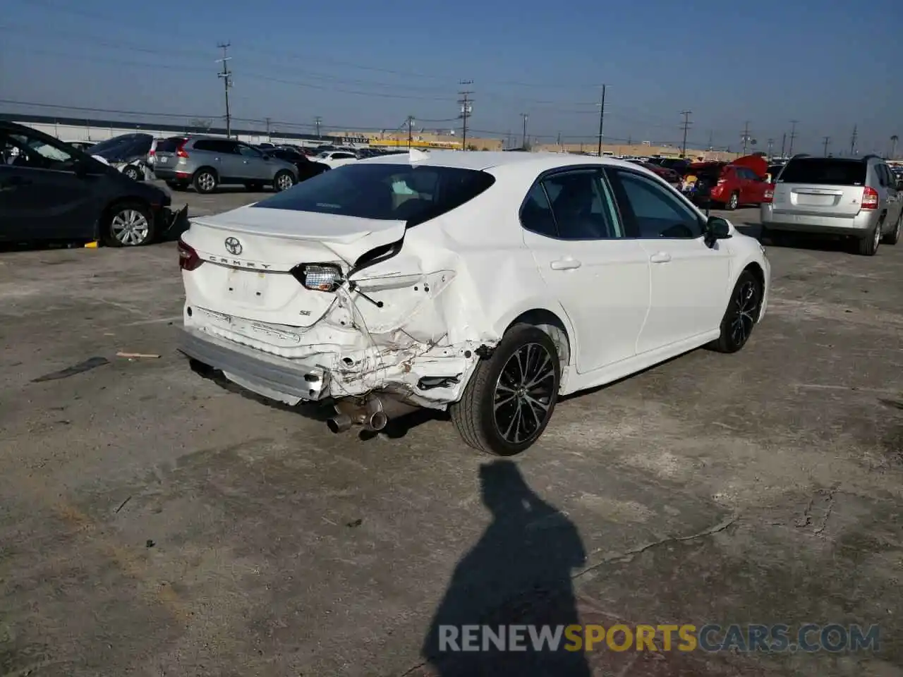 4 Photograph of a damaged car 4T1B11HK4KU212618 TOYOTA CAMRY 2019