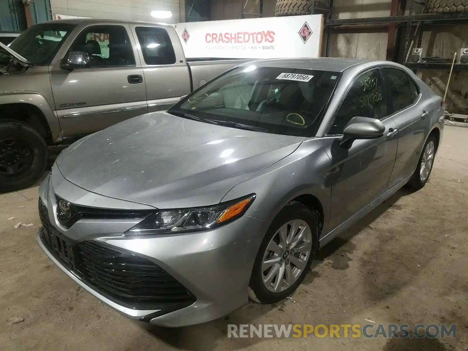 2 Photograph of a damaged car 4T1B11HK4KU213364 TOYOTA CAMRY 2019