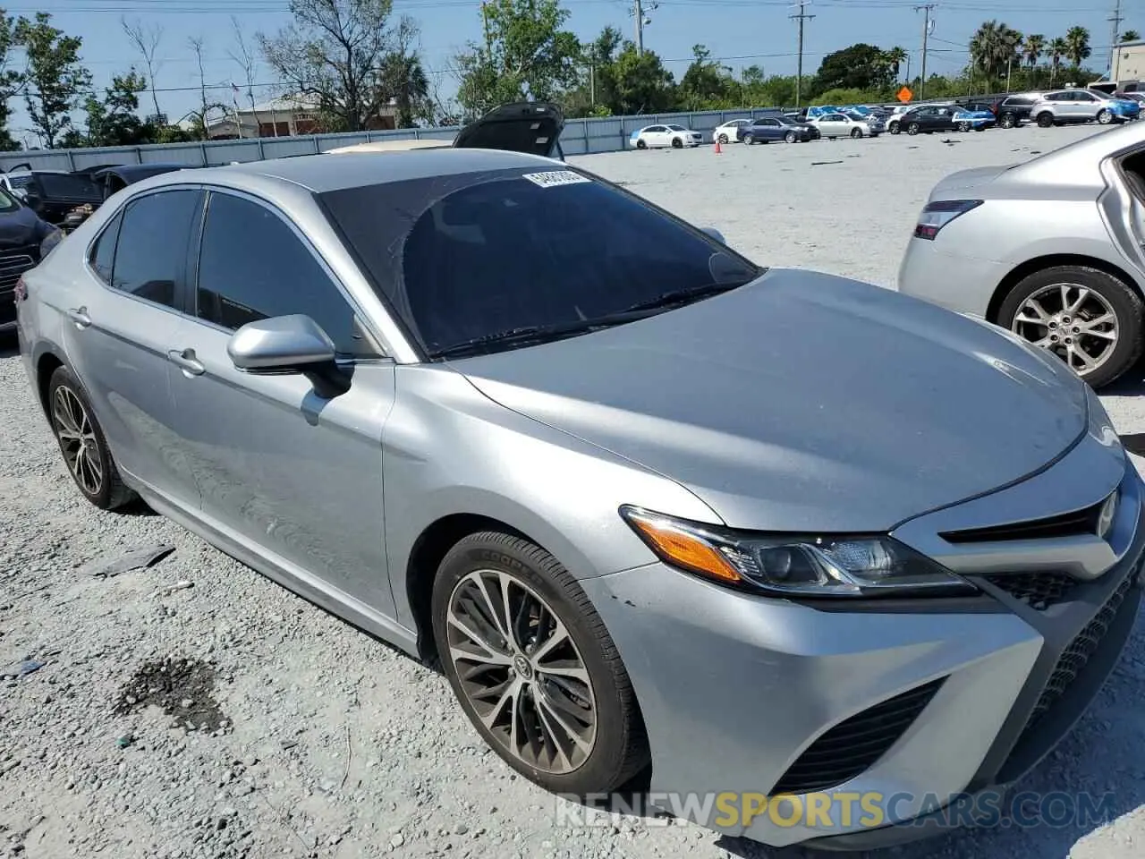 4 Photograph of a damaged car 4T1B11HK4KU216328 TOYOTA CAMRY 2019