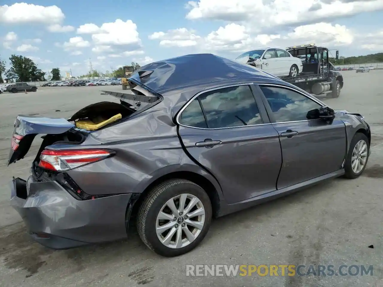 4 Photograph of a damaged car 4T1B11HK4KU225904 TOYOTA CAMRY 2019