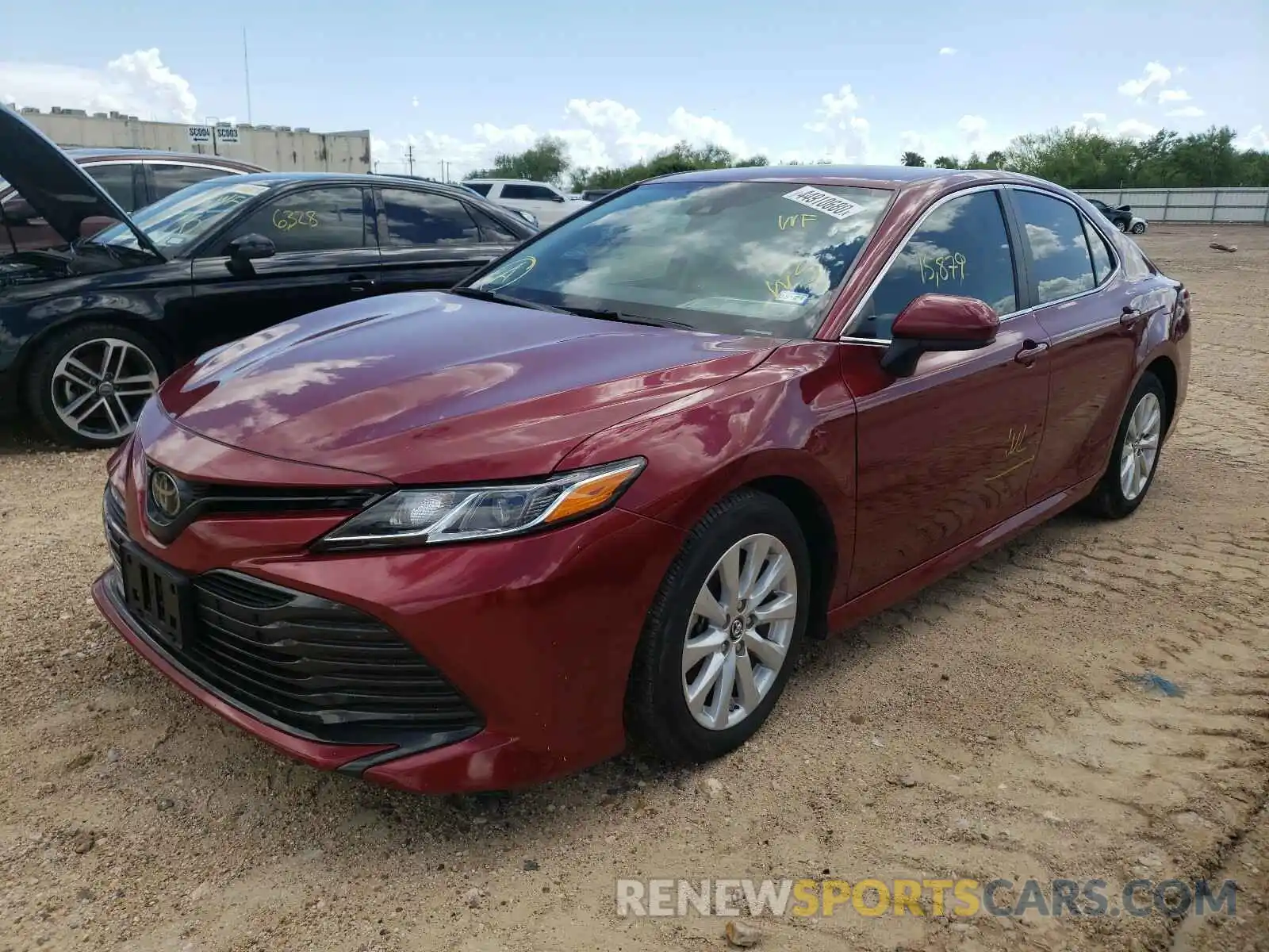 2 Photograph of a damaged car 4T1B11HK4KU235459 TOYOTA CAMRY 2019