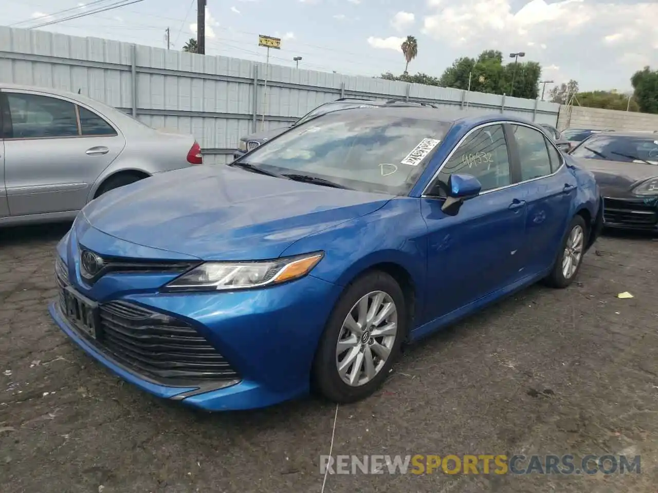 2 Photograph of a damaged car 4T1B11HK4KU236062 TOYOTA CAMRY 2019