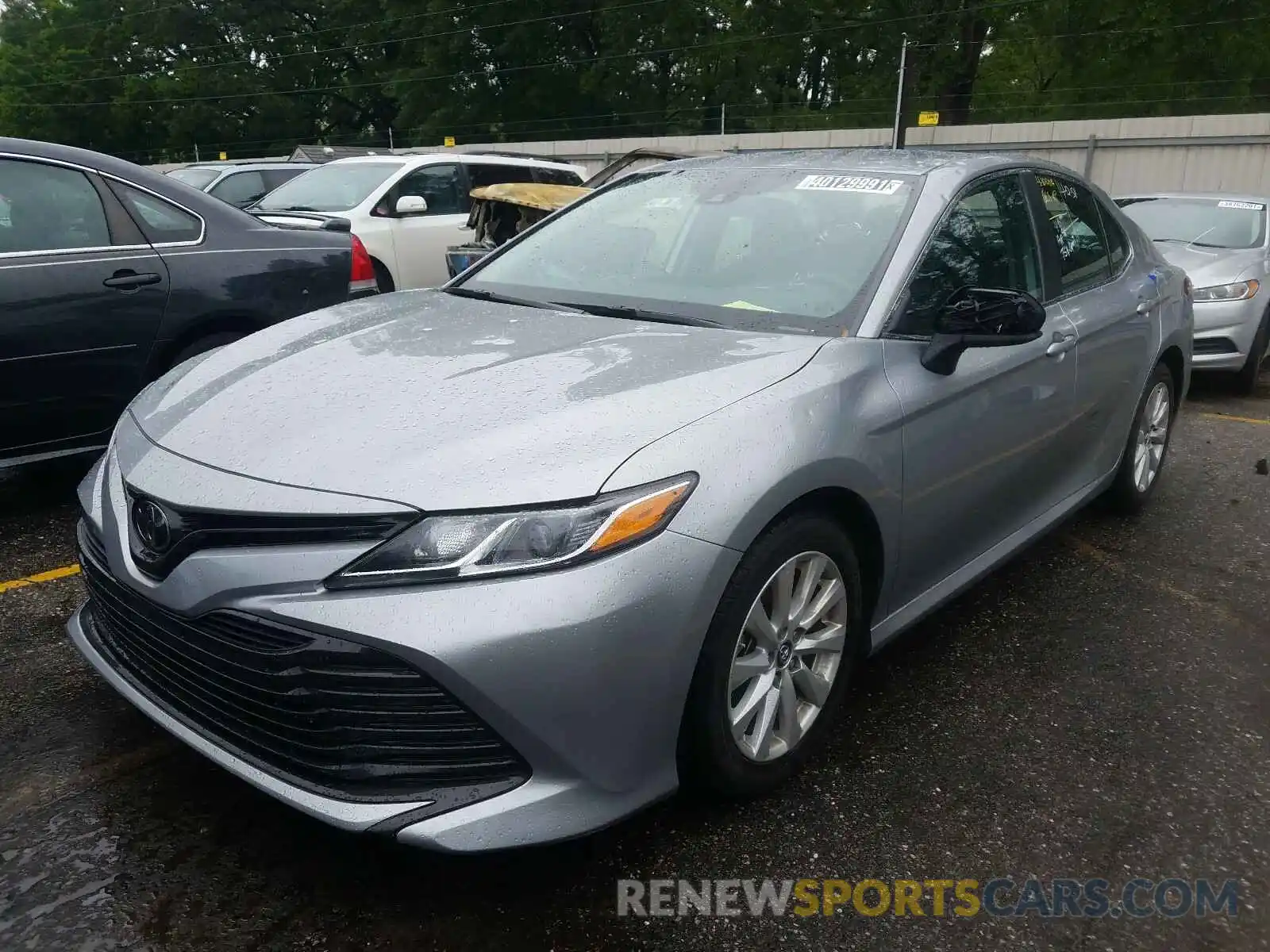 2 Photograph of a damaged car 4T1B11HK4KU239091 TOYOTA CAMRY 2019