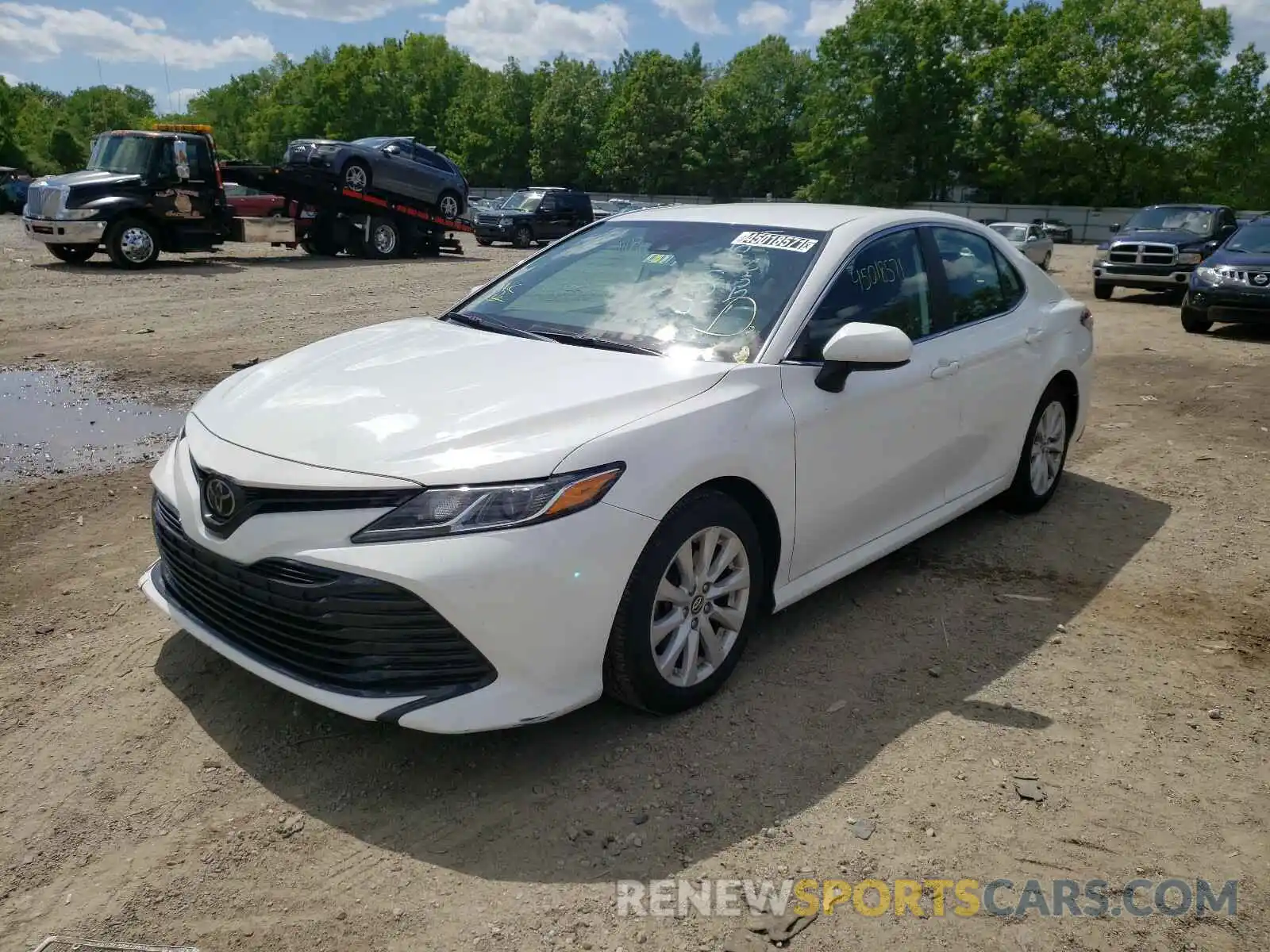 2 Photograph of a damaged car 4T1B11HK4KU239155 TOYOTA CAMRY 2019