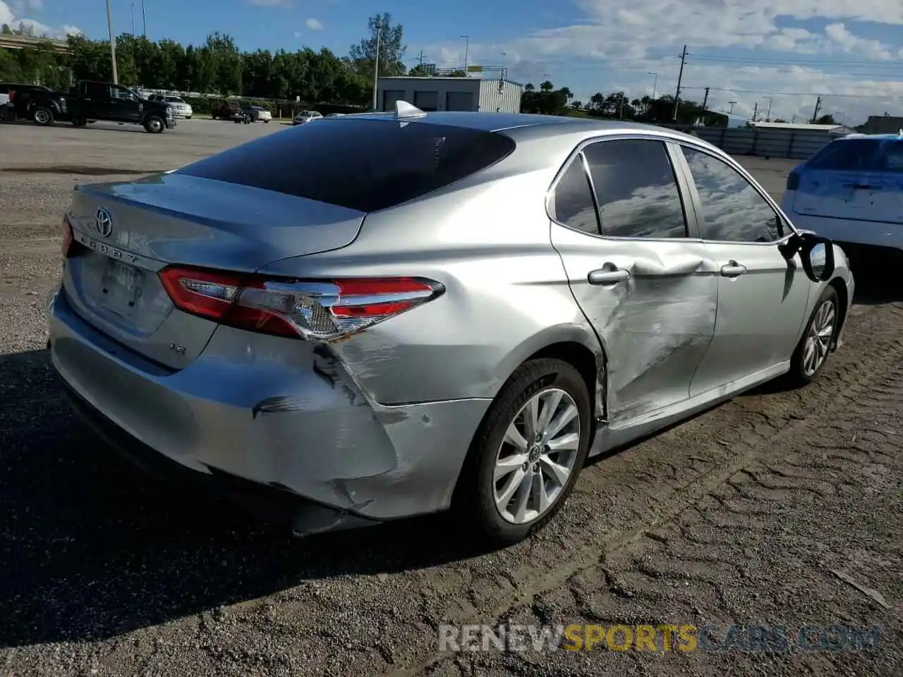 4 Photograph of a damaged car 4T1B11HK4KU240032 TOYOTA CAMRY 2019