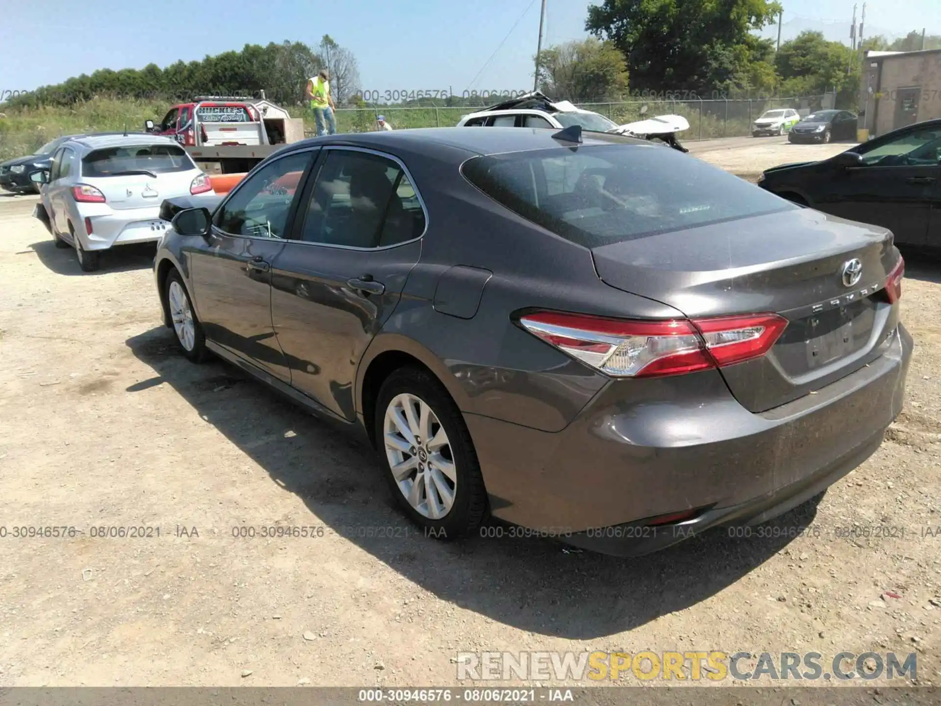 3 Photograph of a damaged car 4T1B11HK4KU241357 TOYOTA CAMRY 2019