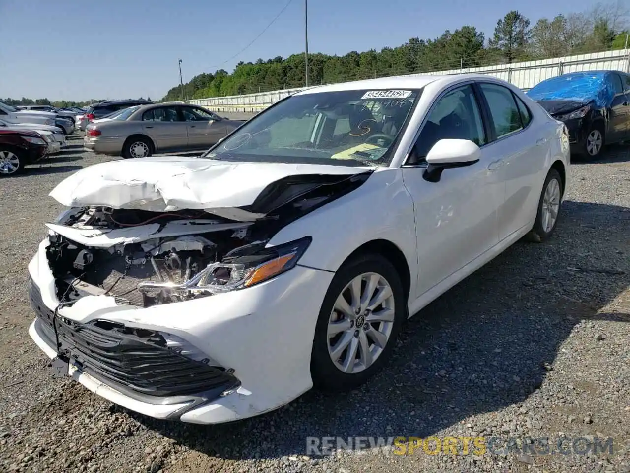 2 Photograph of a damaged car 4T1B11HK4KU241908 TOYOTA CAMRY 2019