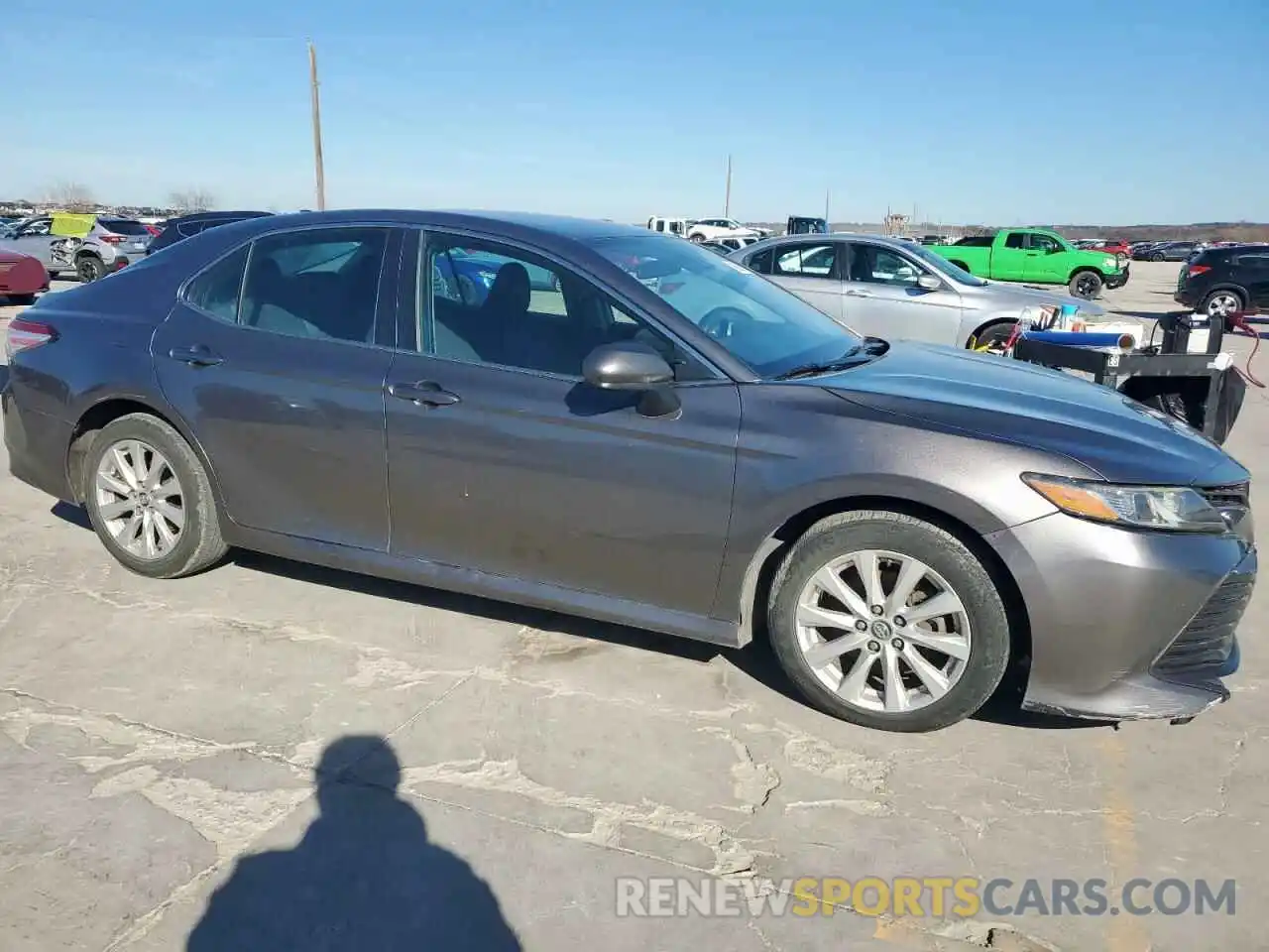 4 Photograph of a damaged car 4T1B11HK4KU242119 TOYOTA CAMRY 2019