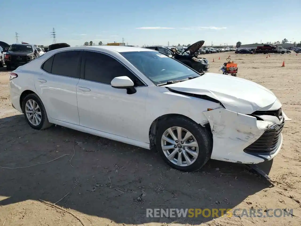 4 Photograph of a damaged car 4T1B11HK4KU243349 TOYOTA CAMRY 2019