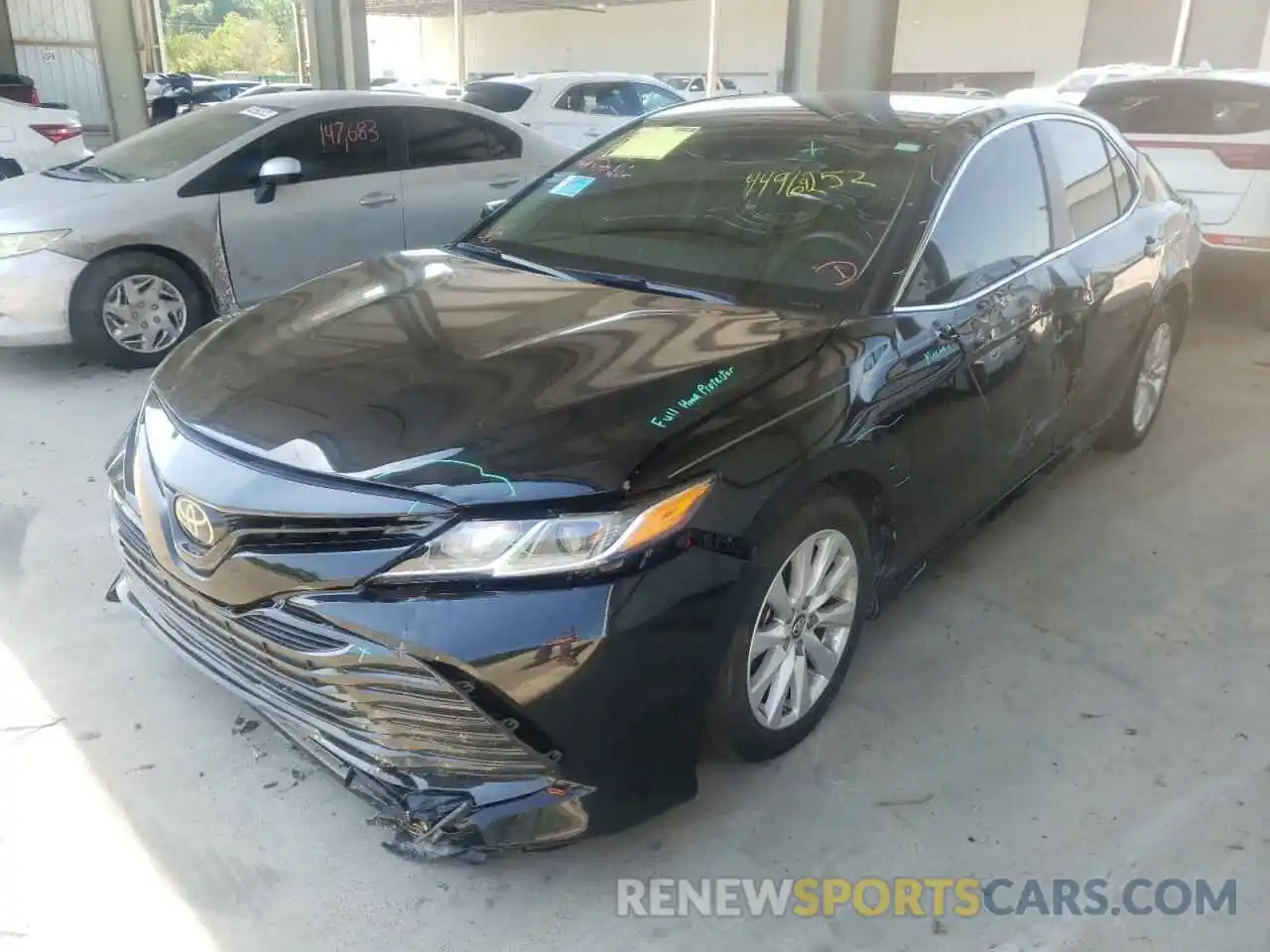 2 Photograph of a damaged car 4T1B11HK4KU249104 TOYOTA CAMRY 2019