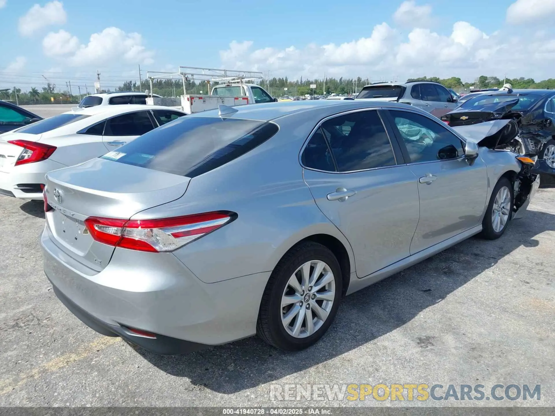 4 Photograph of a damaged car 4T1B11HK4KU249720 TOYOTA CAMRY 2019