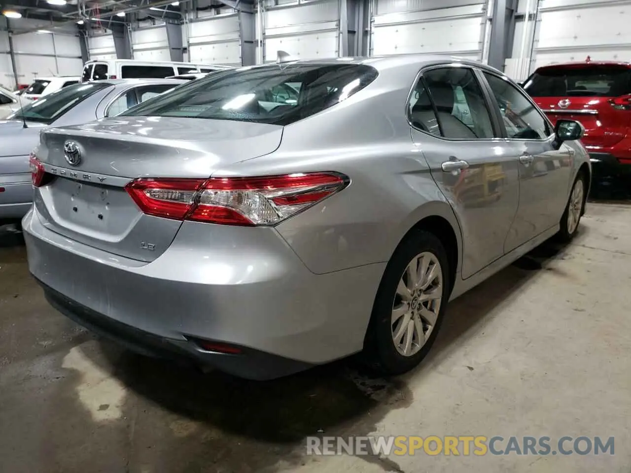 4 Photograph of a damaged car 4T1B11HK4KU253671 TOYOTA CAMRY 2019
