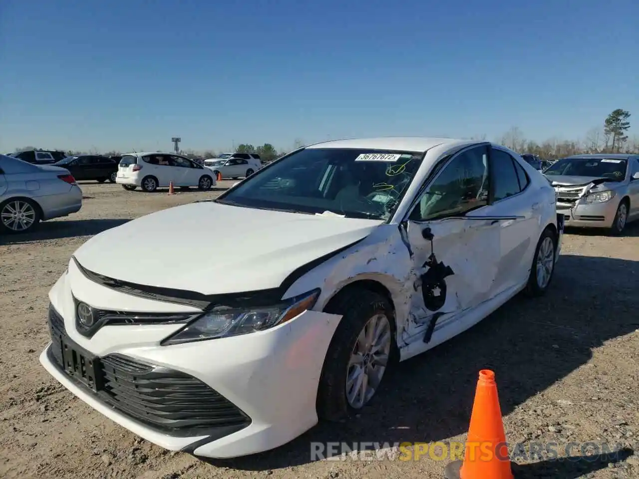 2 Photograph of a damaged car 4T1B11HK4KU255324 TOYOTA CAMRY 2019