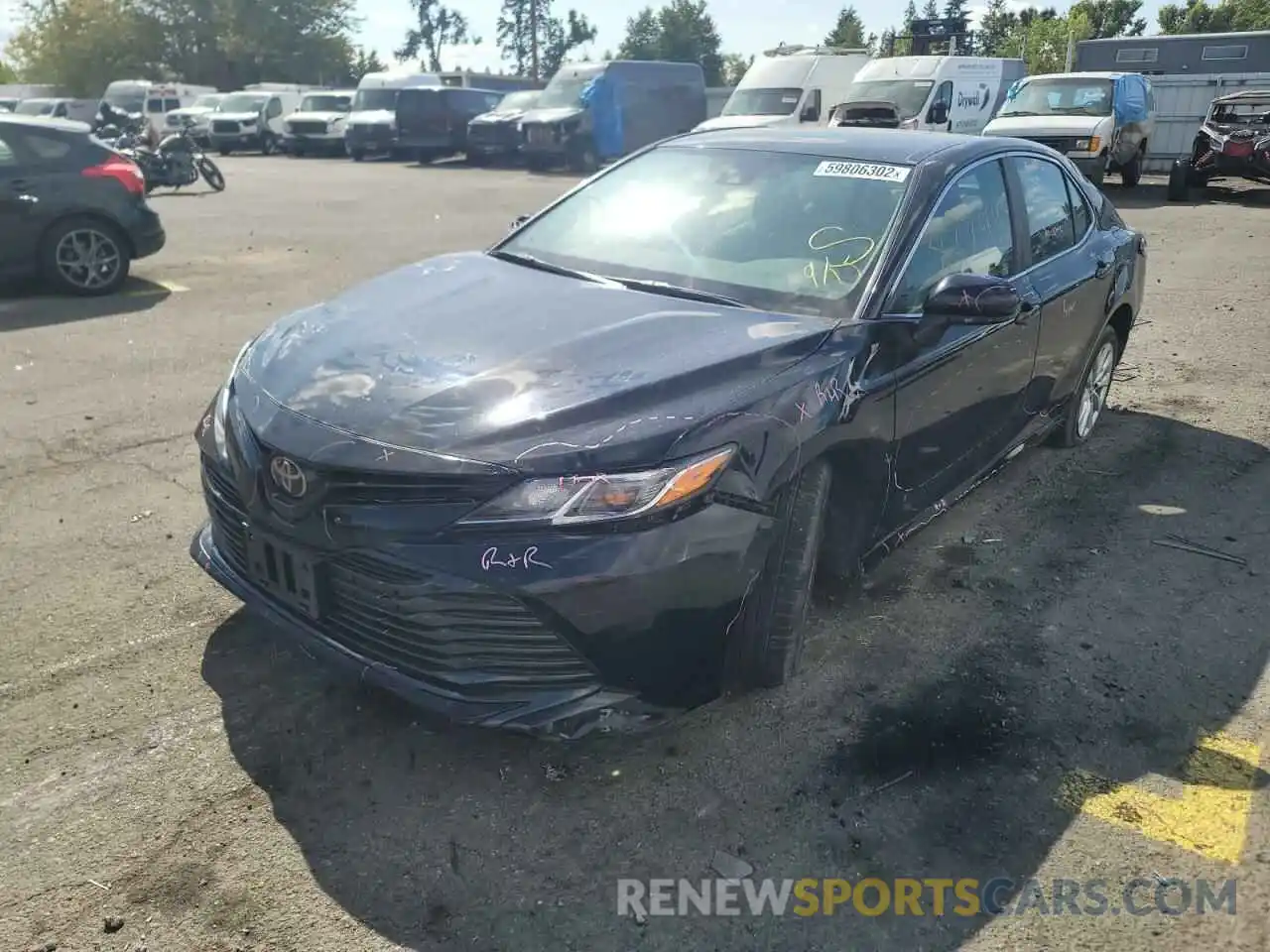 2 Photograph of a damaged car 4T1B11HK4KU256828 TOYOTA CAMRY 2019