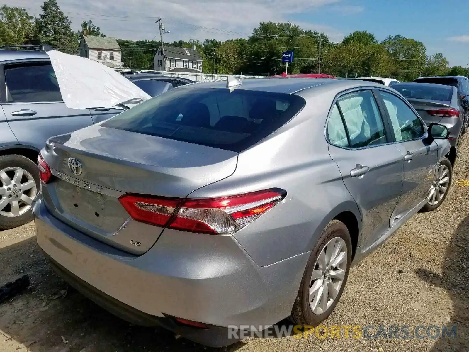 4 Photograph of a damaged car 4T1B11HK4KU258417 TOYOTA CAMRY 2019