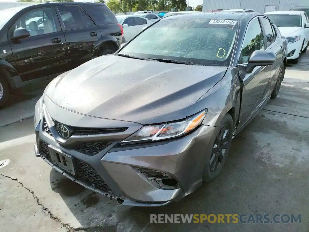 2 Photograph of a damaged car 4T1B11HK4KU260474 TOYOTA CAMRY 2019