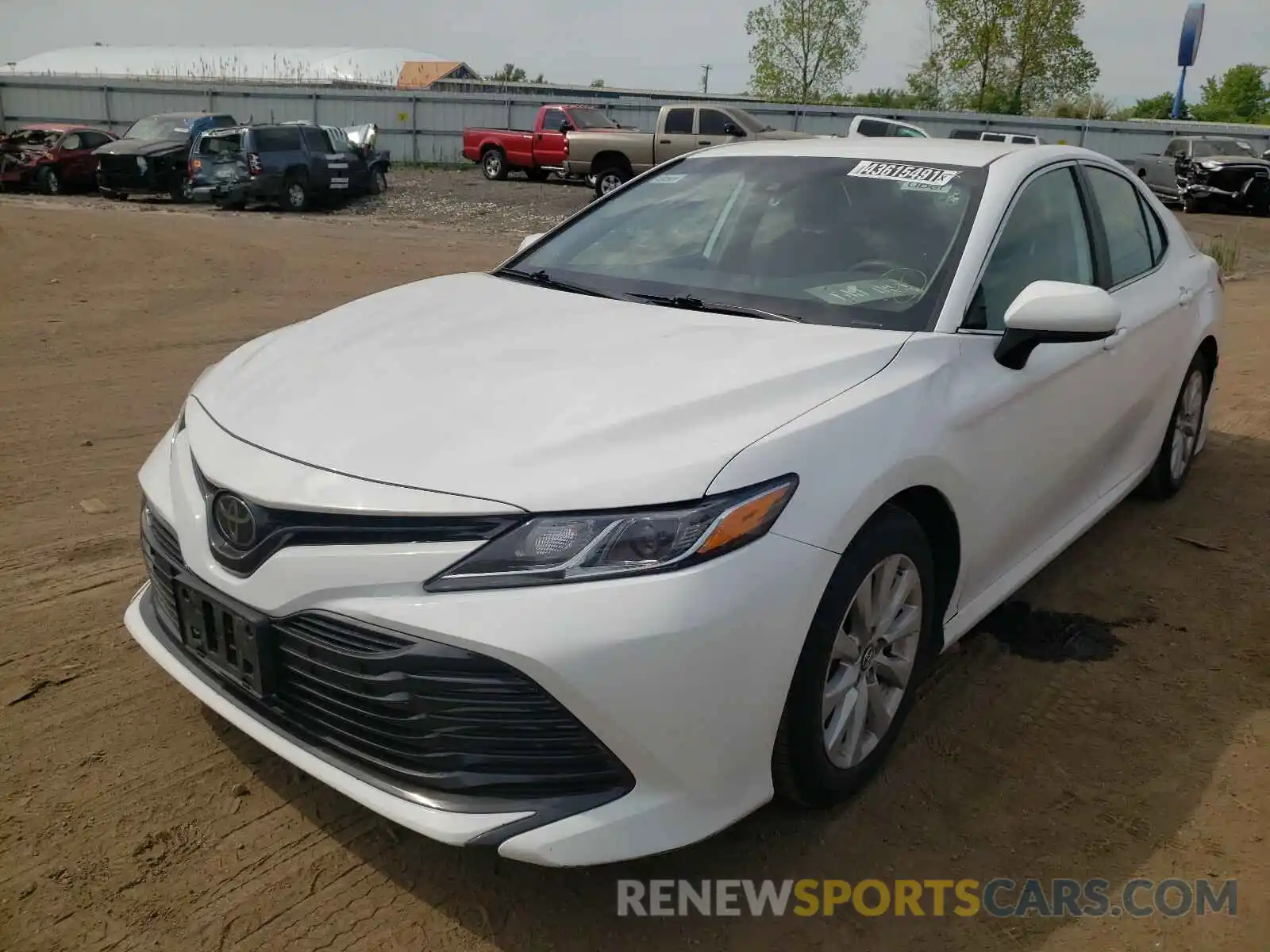 2 Photograph of a damaged car 4T1B11HK4KU262502 TOYOTA CAMRY 2019