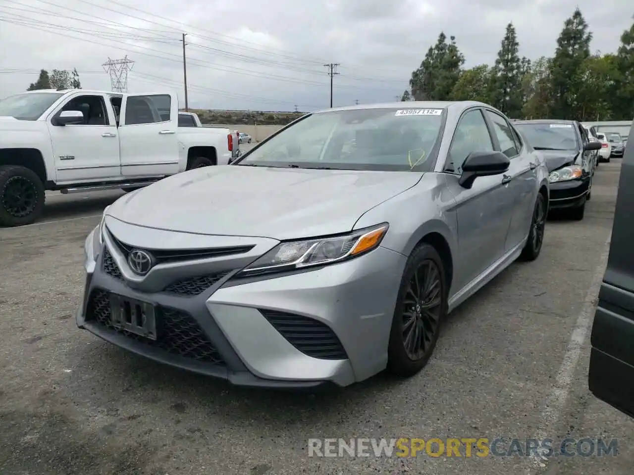 2 Photograph of a damaged car 4T1B11HK4KU263455 TOYOTA CAMRY 2019