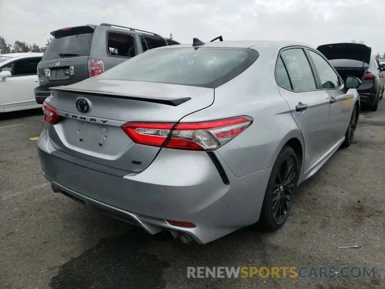 4 Photograph of a damaged car 4T1B11HK4KU263455 TOYOTA CAMRY 2019