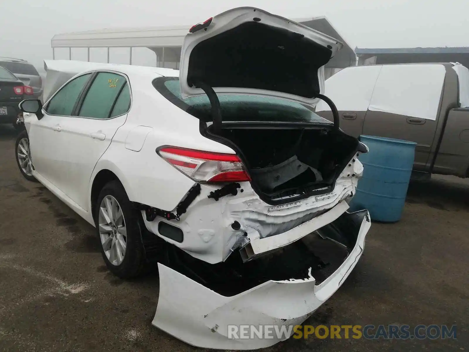 3 Photograph of a damaged car 4T1B11HK4KU268011 TOYOTA CAMRY 2019