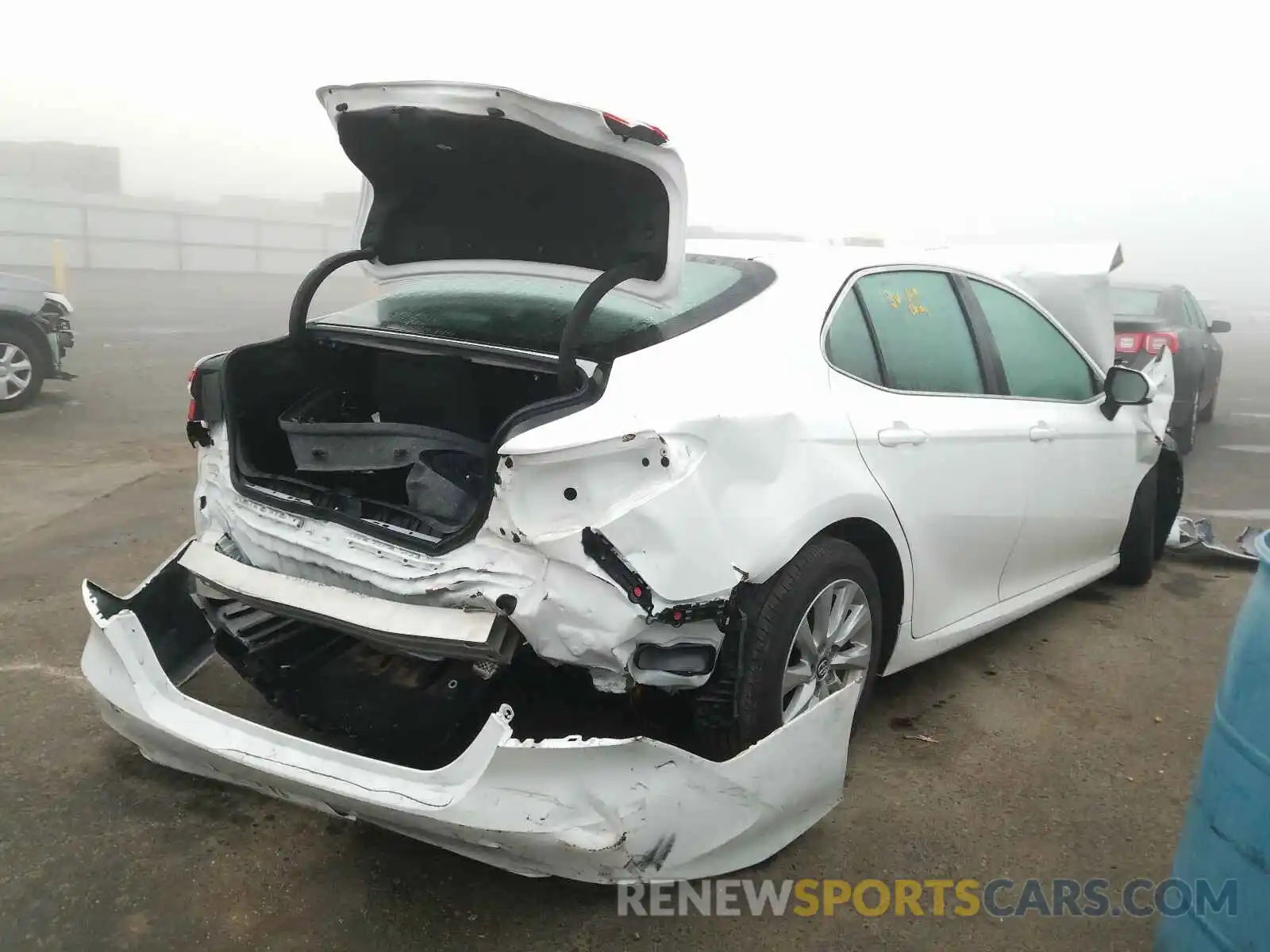 4 Photograph of a damaged car 4T1B11HK4KU268011 TOYOTA CAMRY 2019