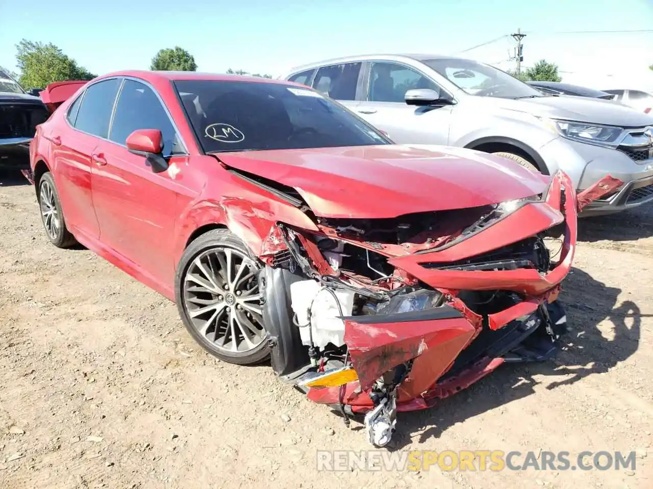 1 Photograph of a damaged car 4T1B11HK4KU270762 TOYOTA CAMRY 2019